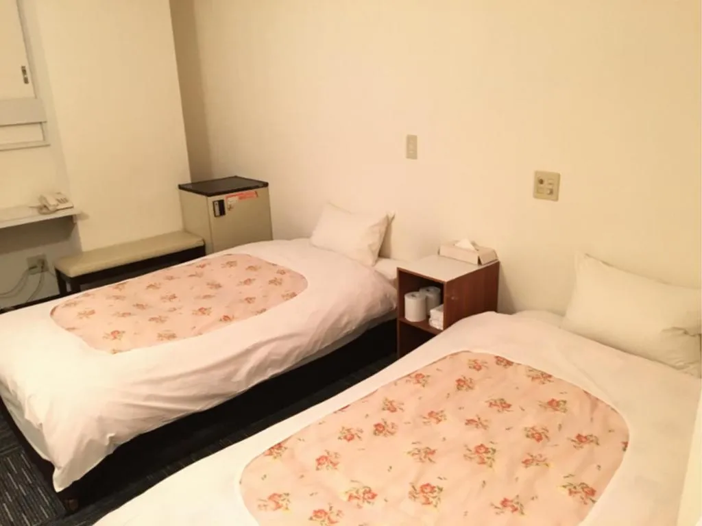 Bed in Ikebukuro Royal Hotel Higashiguchi