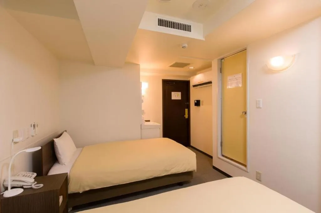 Bed in Ikebukuro Royal Hotel Higashiguchi