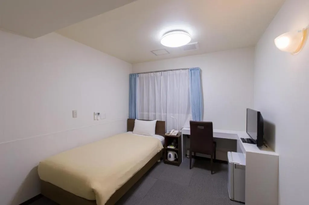 Bed in Ikebukuro Royal Hotel Higashiguchi