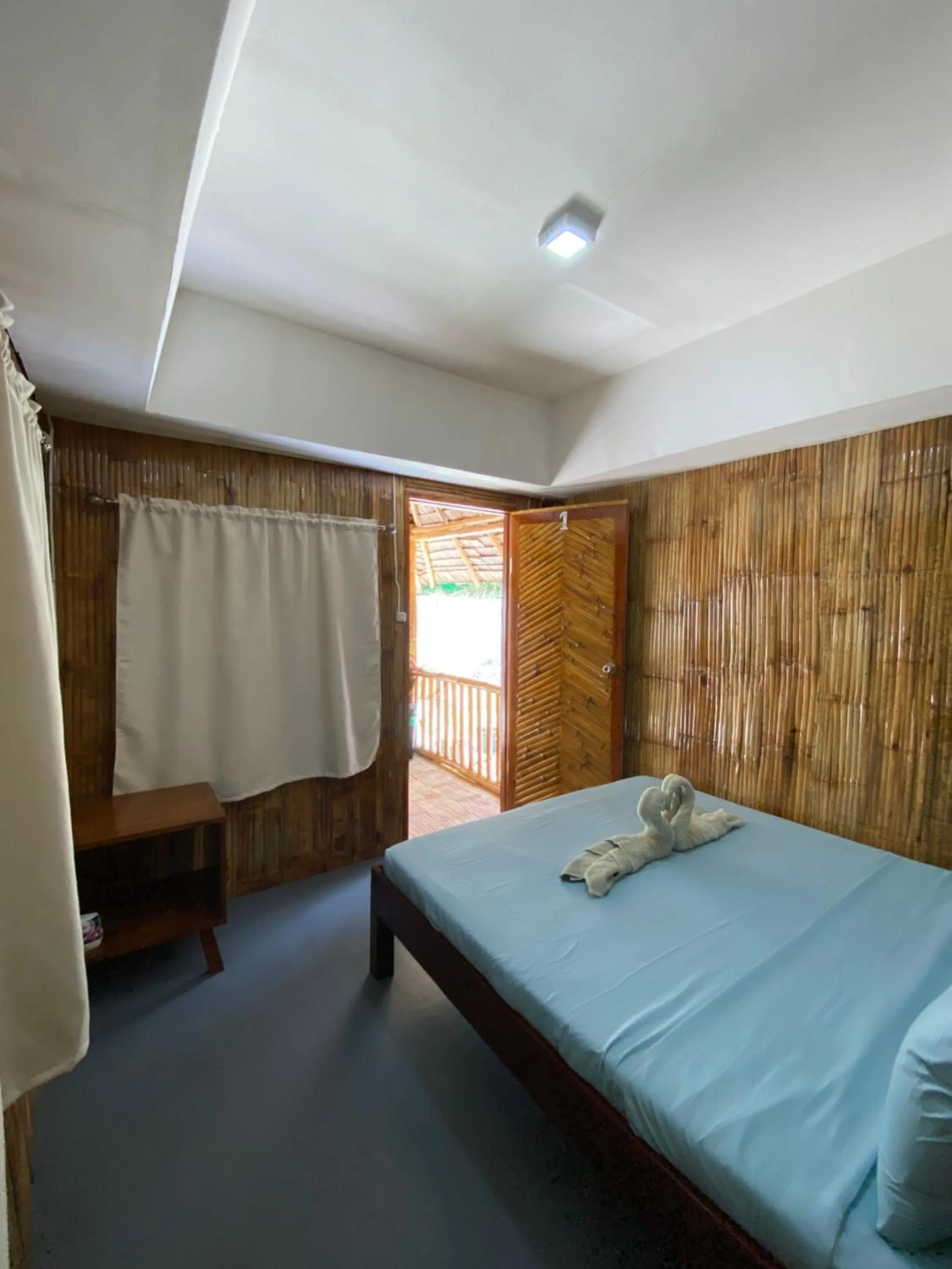 Bed in Moalboal Beach Front Hotel