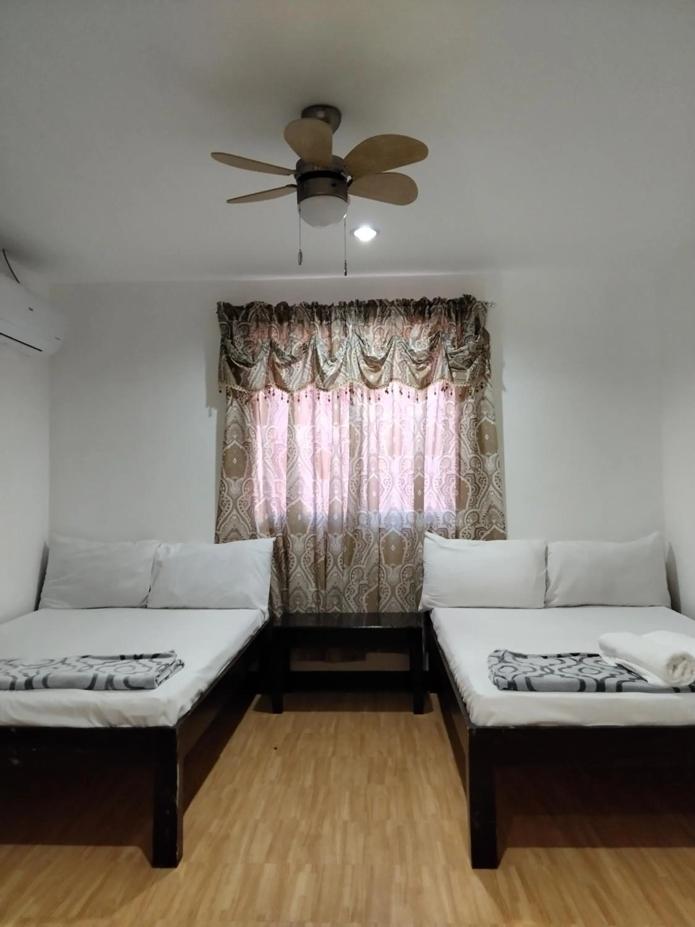 Bed in Moalboal Beach Front Hotel