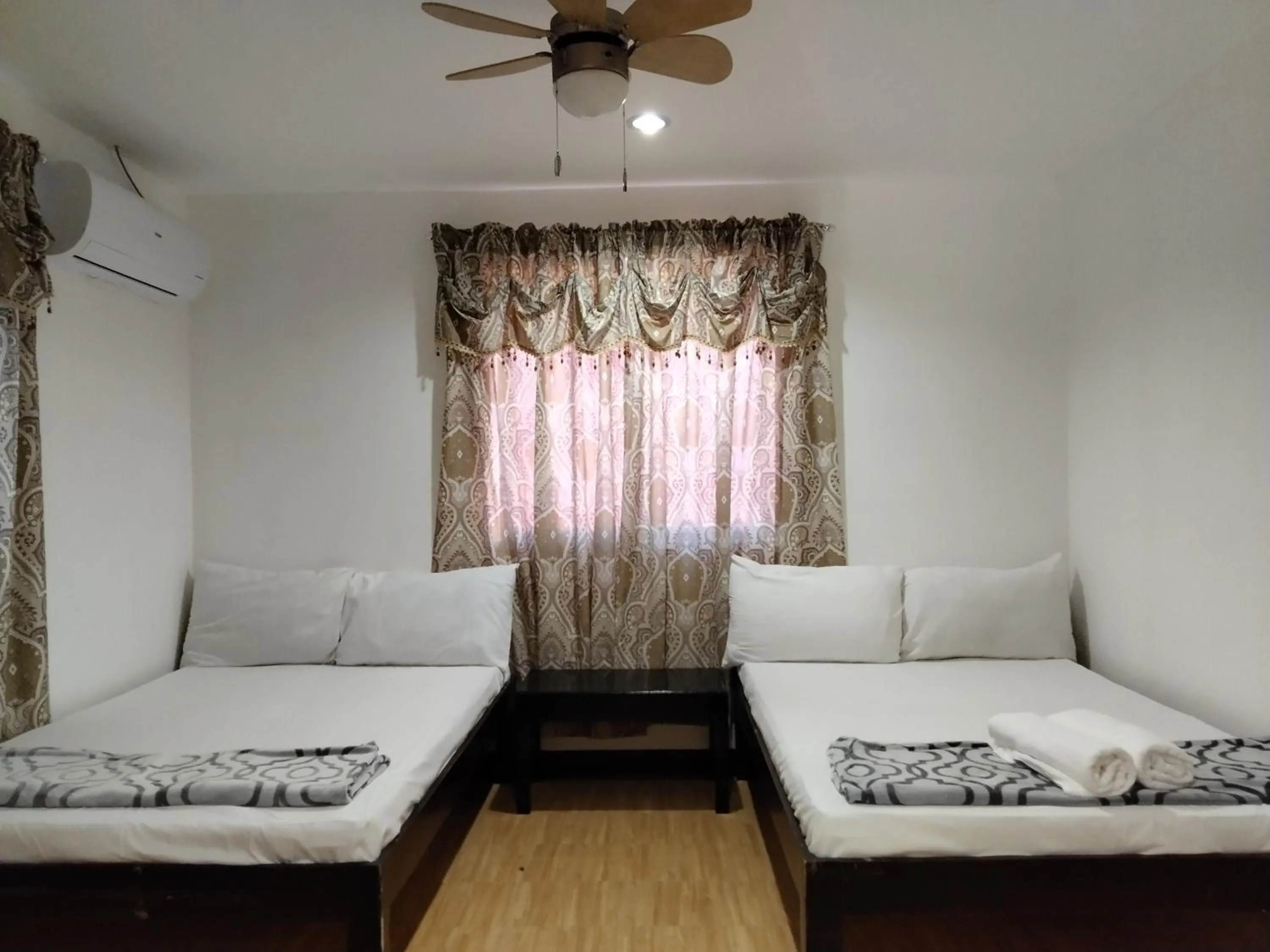 Bed in Moalboal Beach Front Hotel