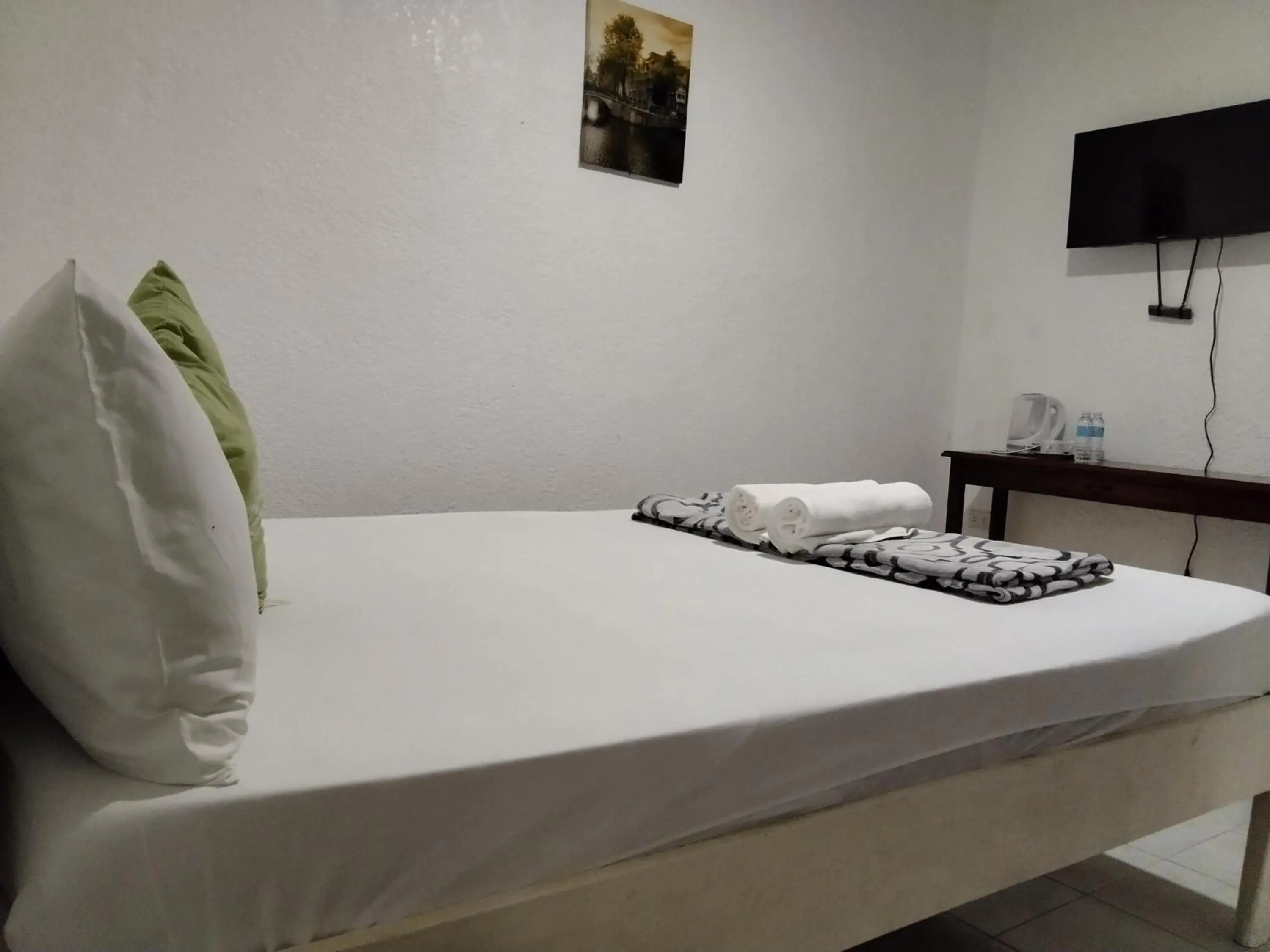 Property building, Bed in Moalboal Beach Front Hotel