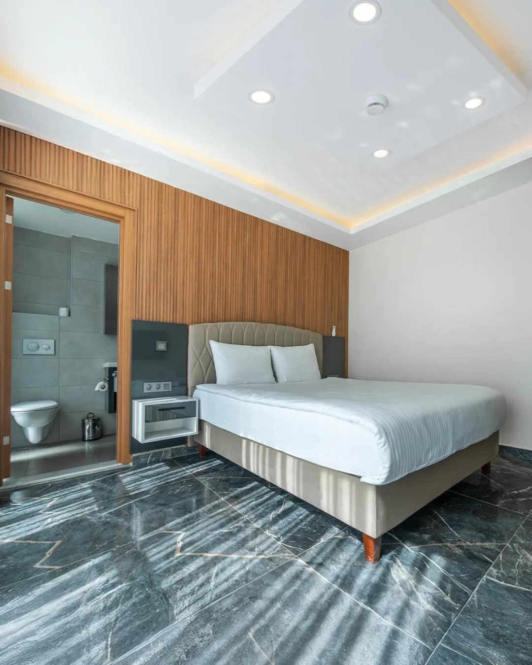 Bed in Evin Park Suit Lara & Spa