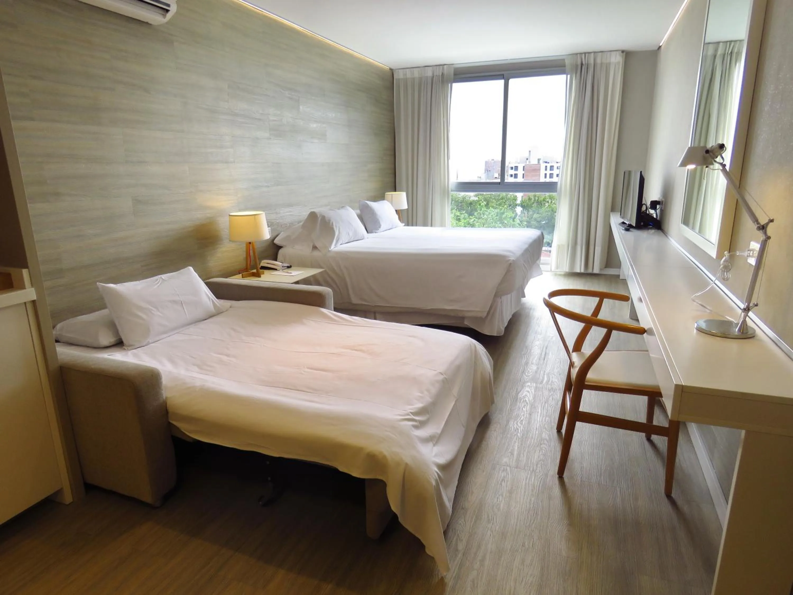 Bed in Smart Hotel Montevideo