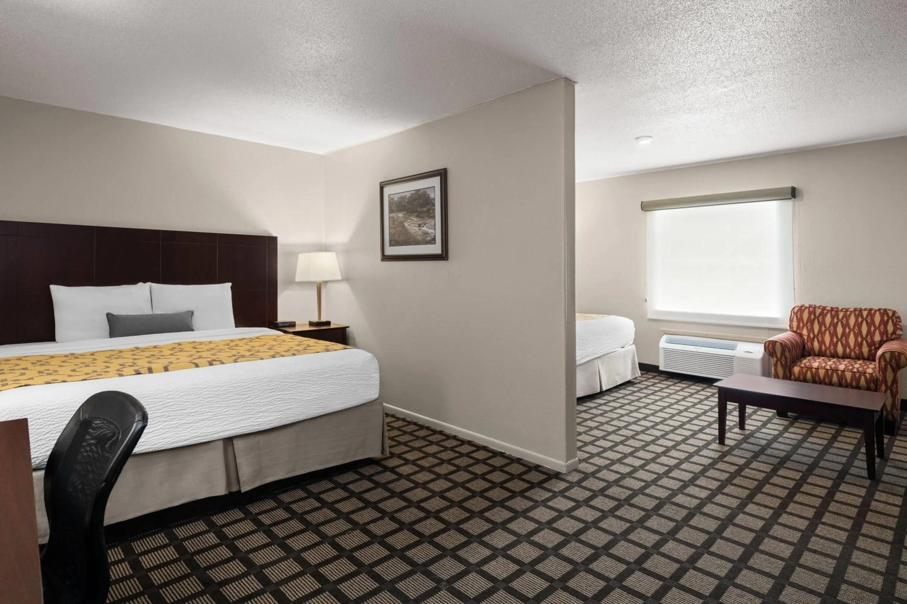 Photo of the whole room, Bed in Baymont by Wyndham Jefferson City