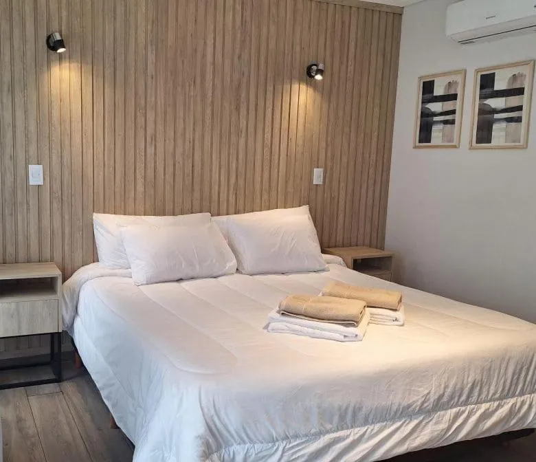 Bed in BlackStone Apart Boutique Hotel