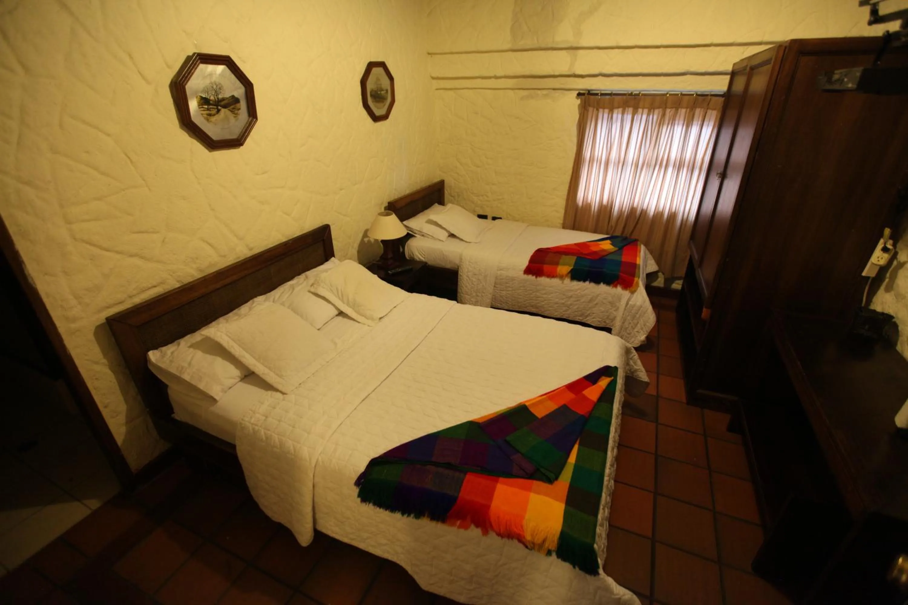Bed in HOTEL Quito Antiguo