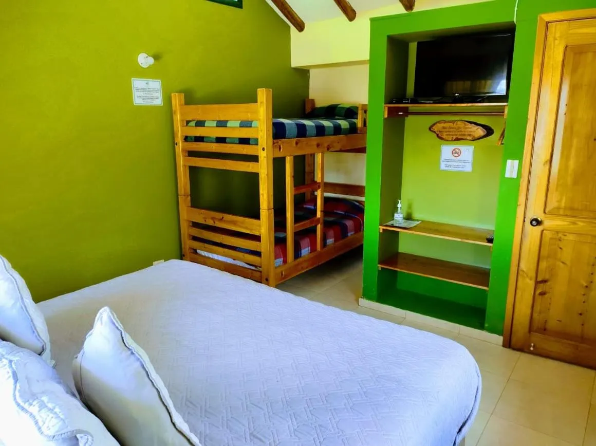 Bed in Hotel Cabañas San Cayetano