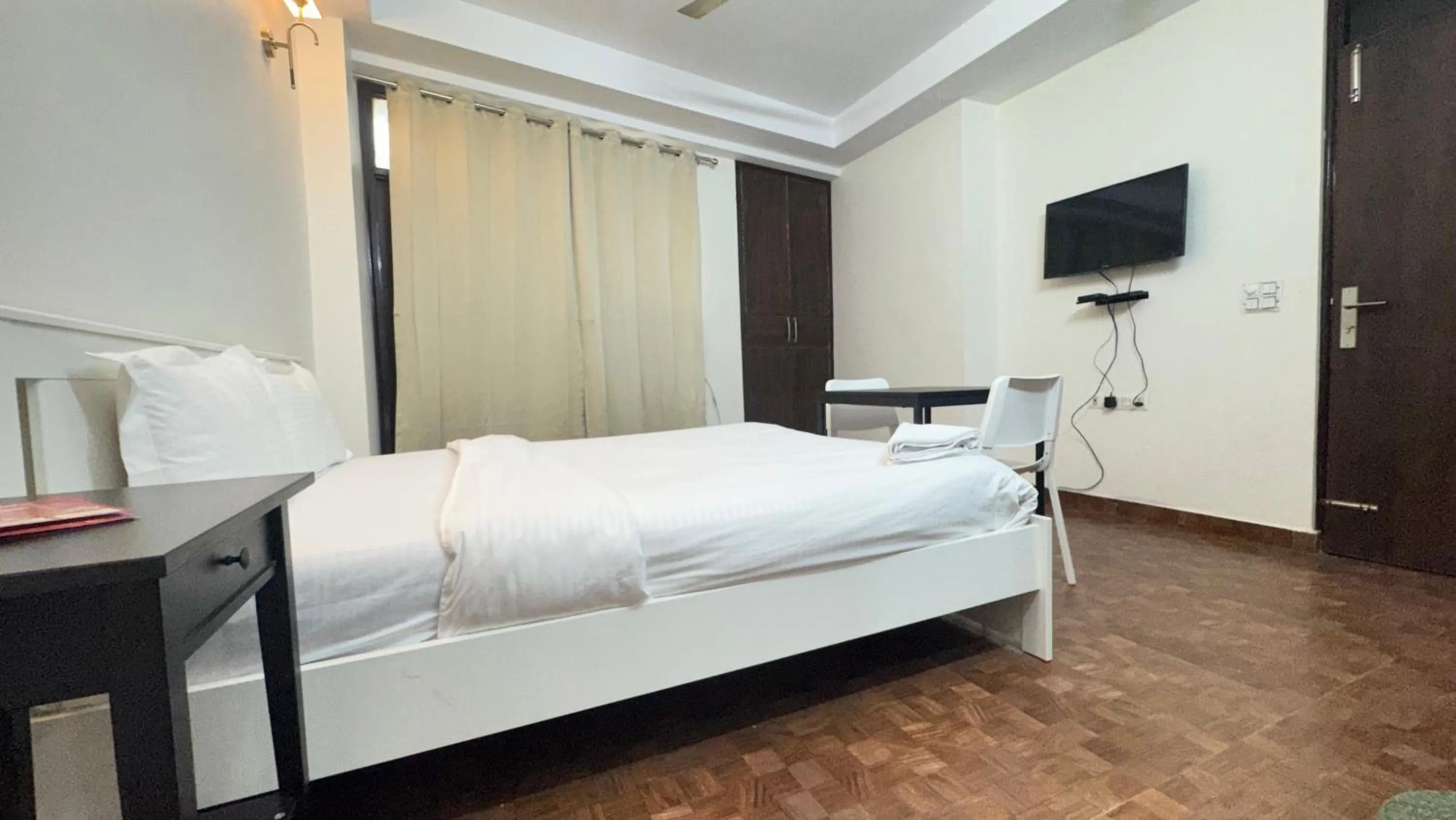 Bed in Hotel Kundan Palace