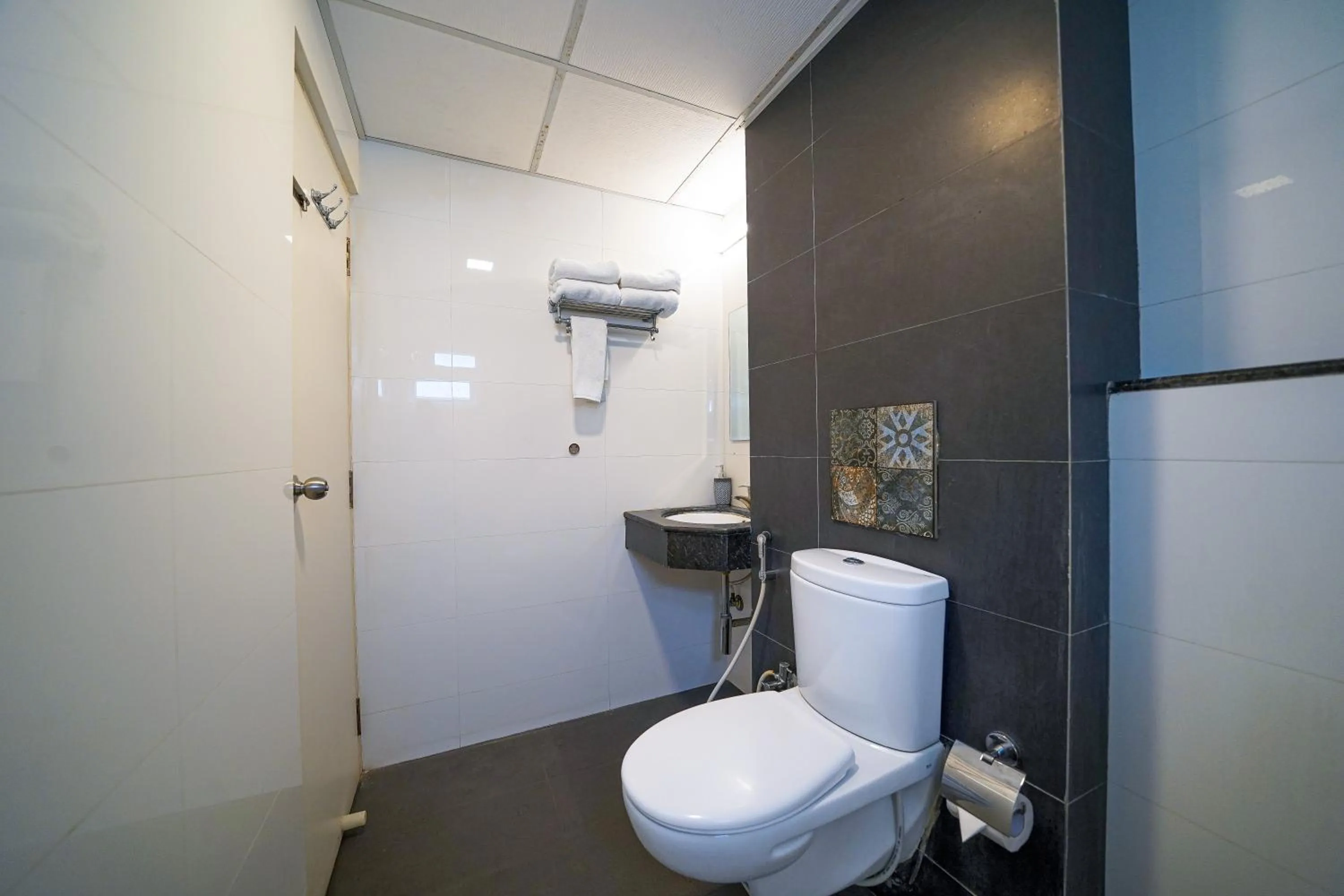 Toilet in Olive Hotel Electronic City by Embassy Group