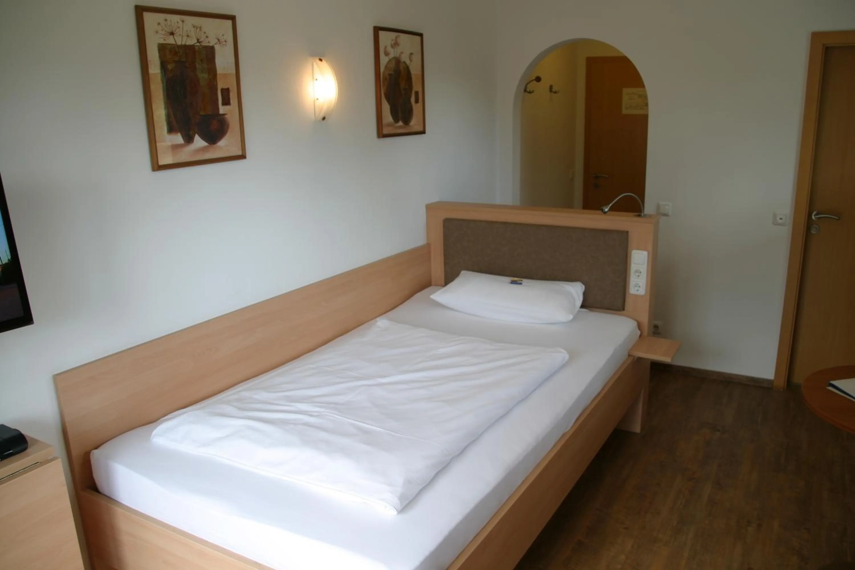 Bed in Hotel-Restaurant Bellevue