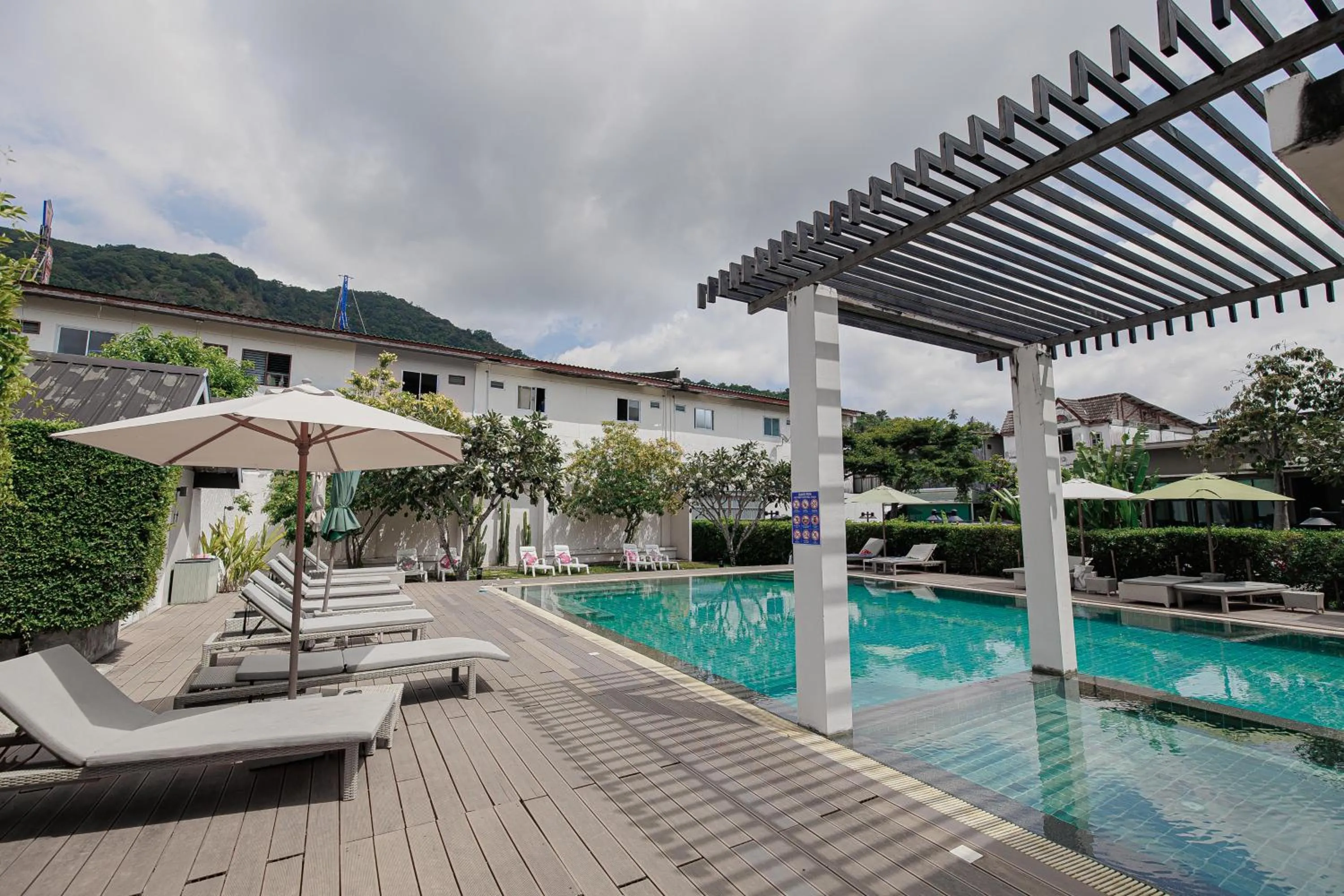 Swimming pool in The Melody Phuket - SHA Extra Plus