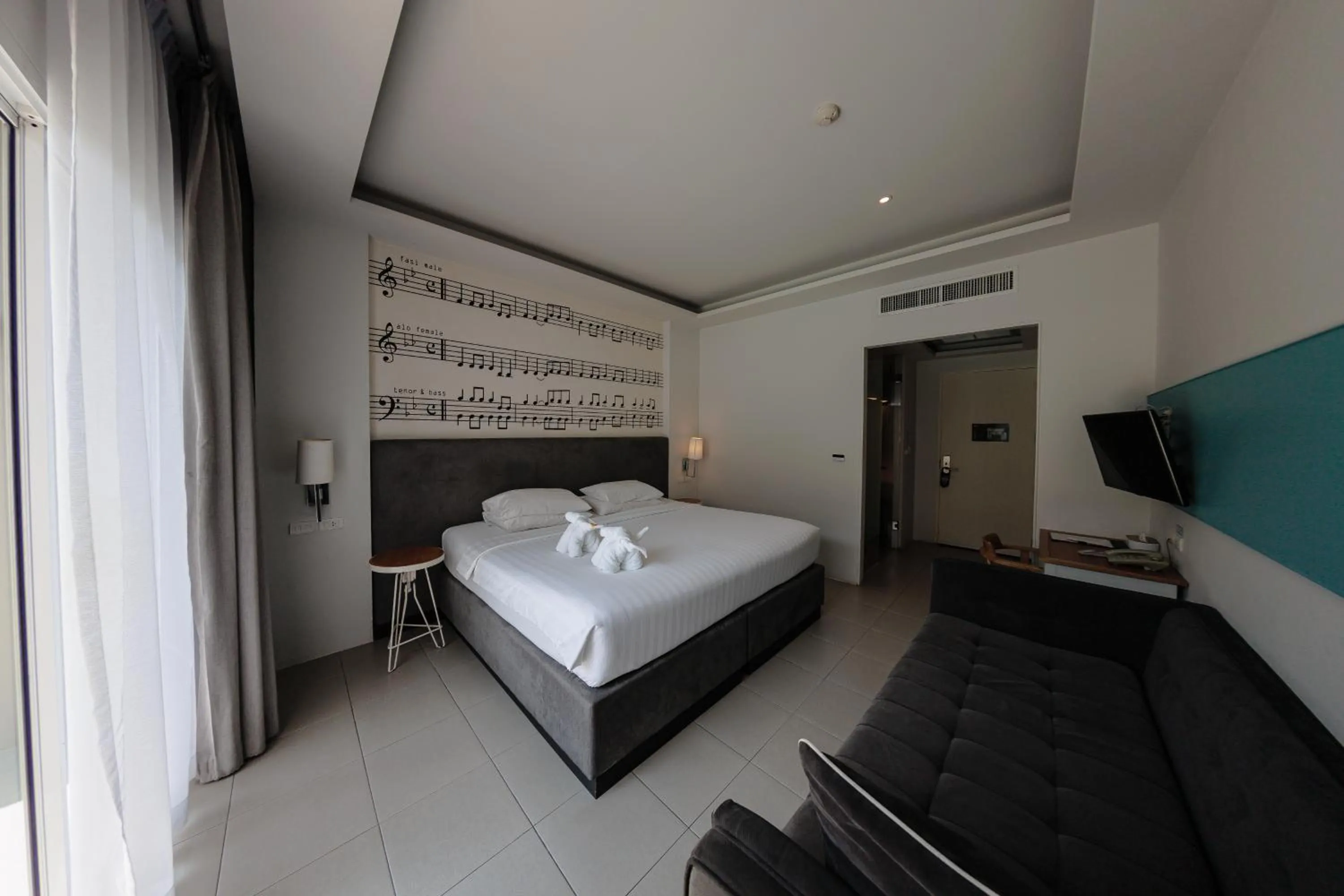 View (from property/room), Bed in The Melody Phuket - SHA Extra Plus