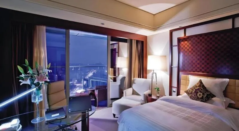 Bed in Shangyu International Hotel