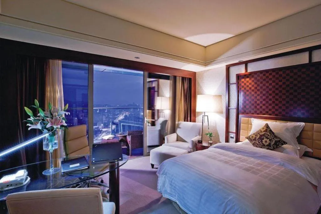 Bed in Shangyu International Hotel