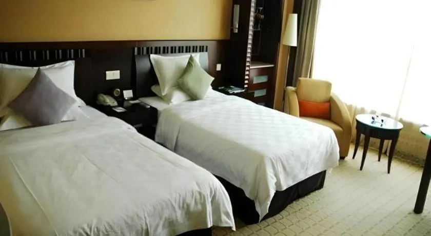 Bed in Shangyu International Hotel