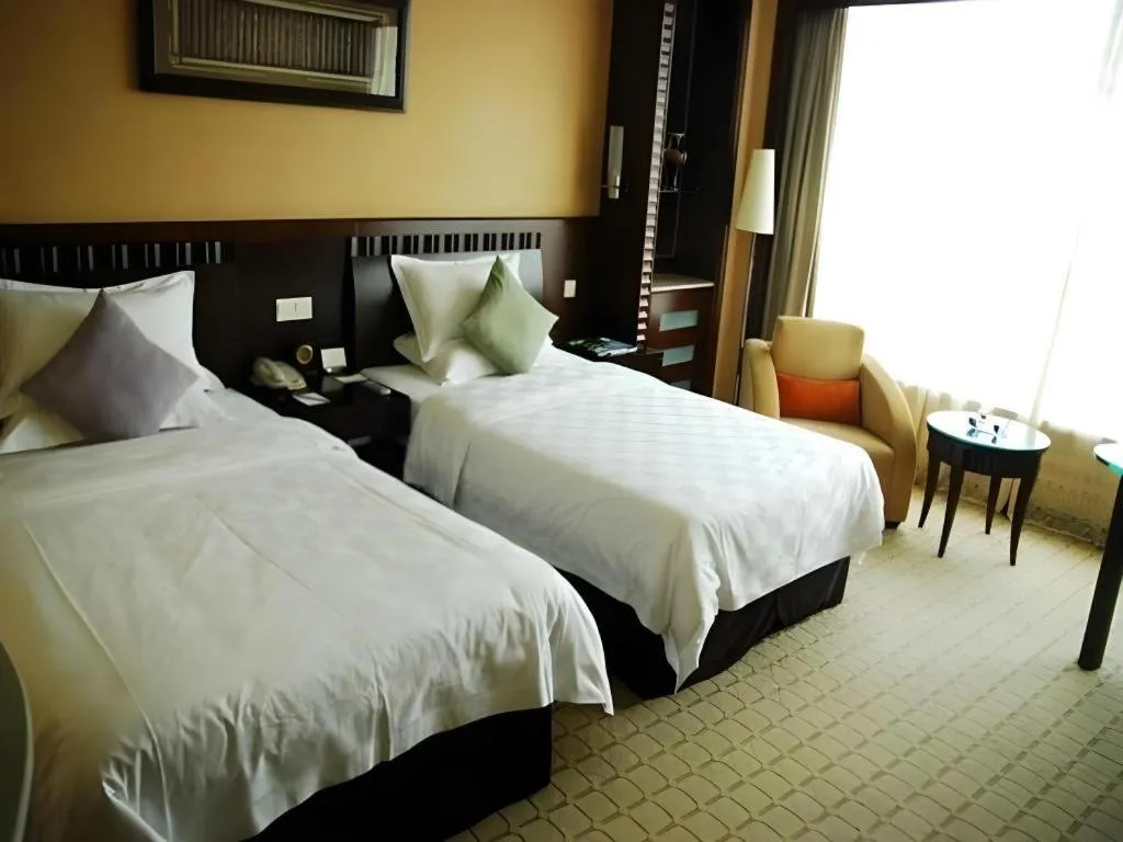 Bed in Shangyu International Hotel