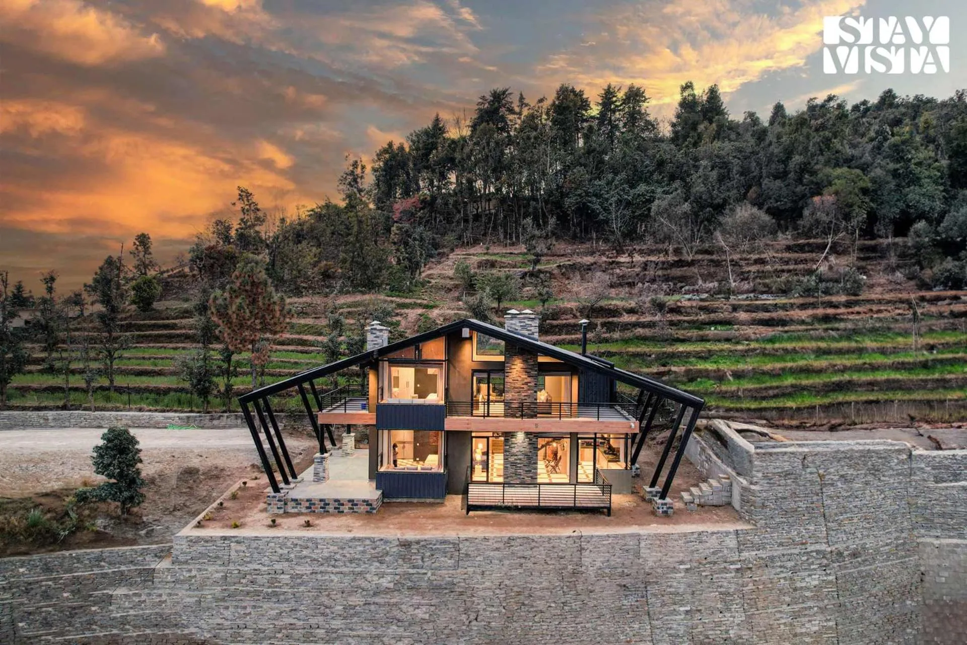 Property building in StayVista at Mountain Melody with Heater & Indoor-Outdoor Games