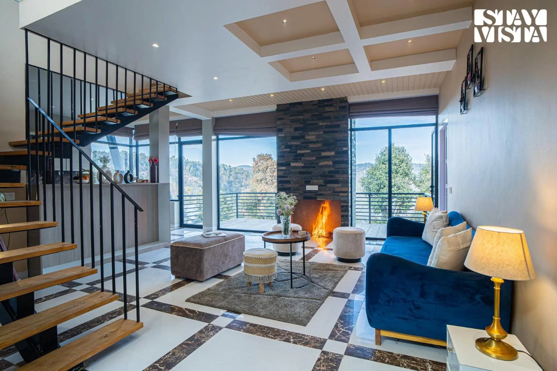 Living room in StayVista at Mountain Melody with Heater & Indoor-Outdoor Games