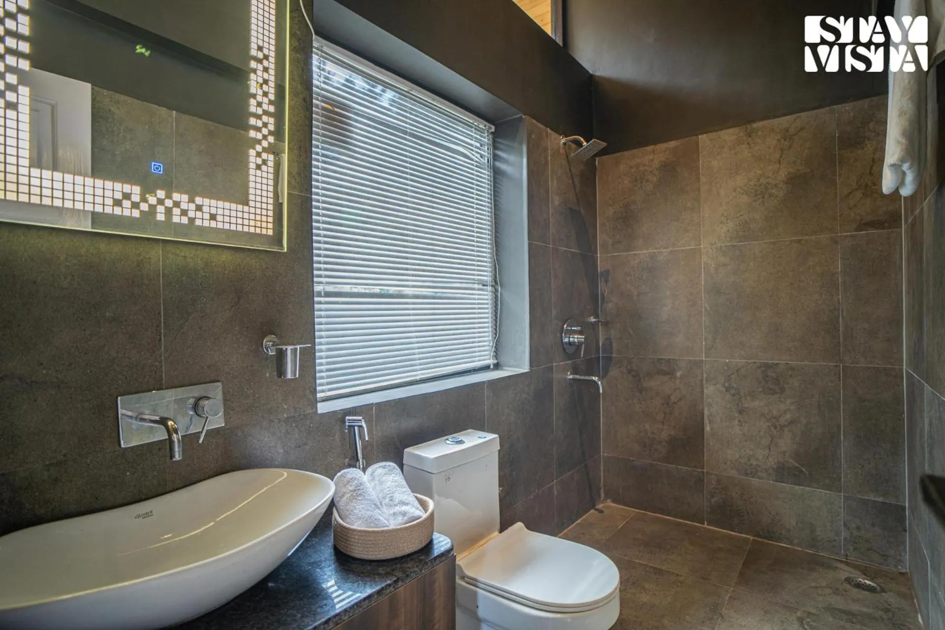 Bathroom in StayVista at Mountain Melody with Heater & Indoor-Outdoor Games