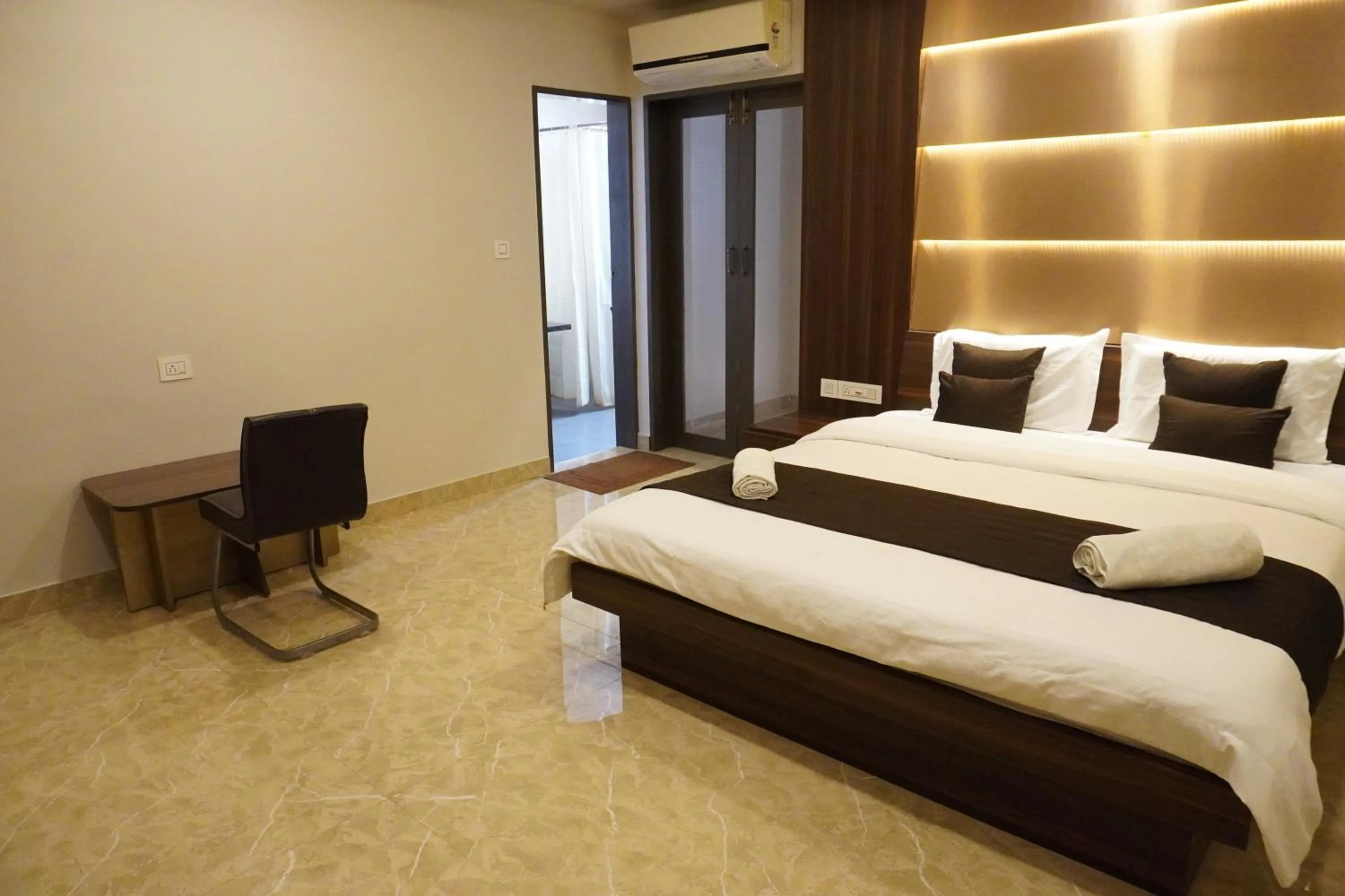 Living room, Bed in HSM Grand Inn, Chittoor