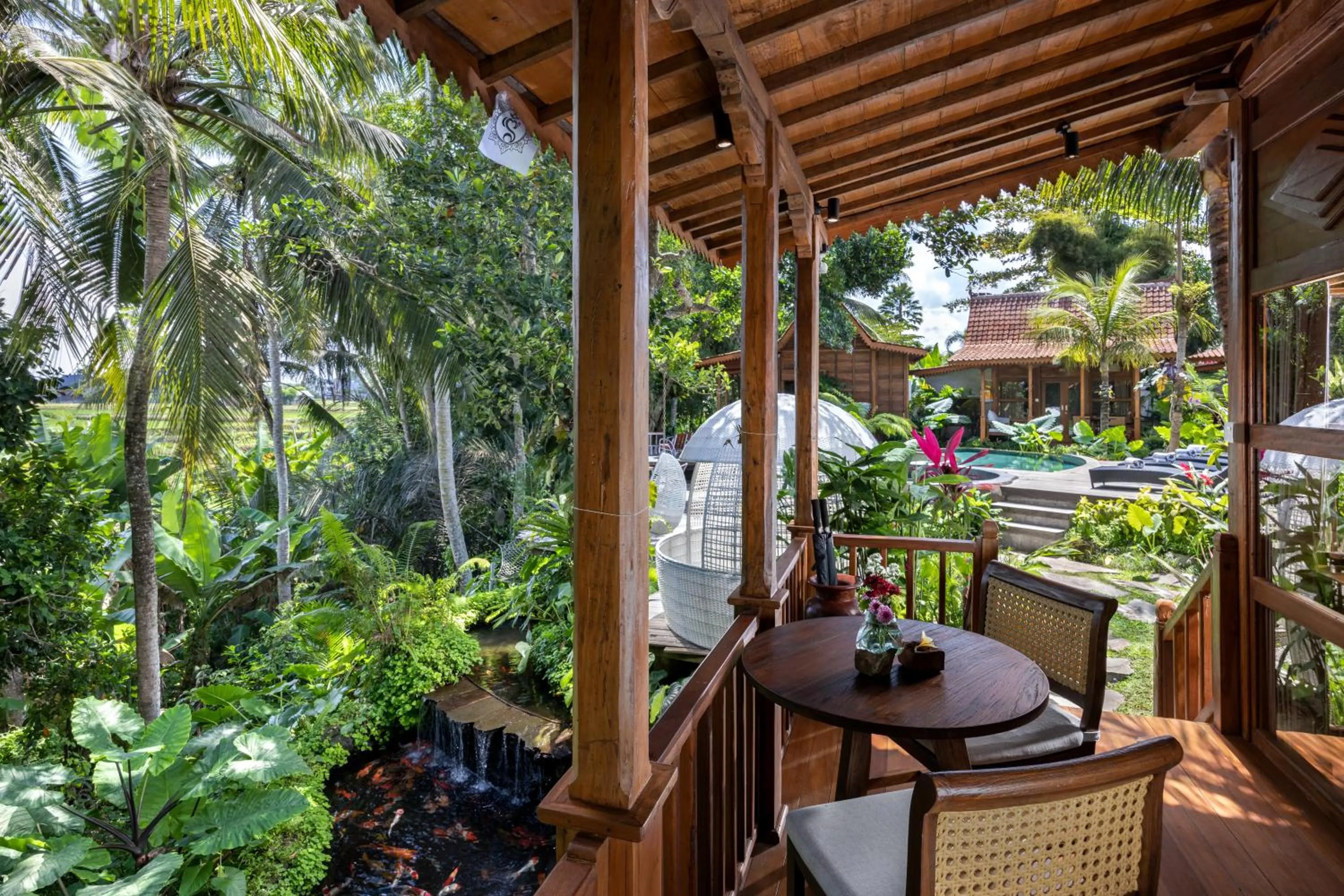 Balcony/Terrace in Berlima Wooden Lodge by GenuineHost