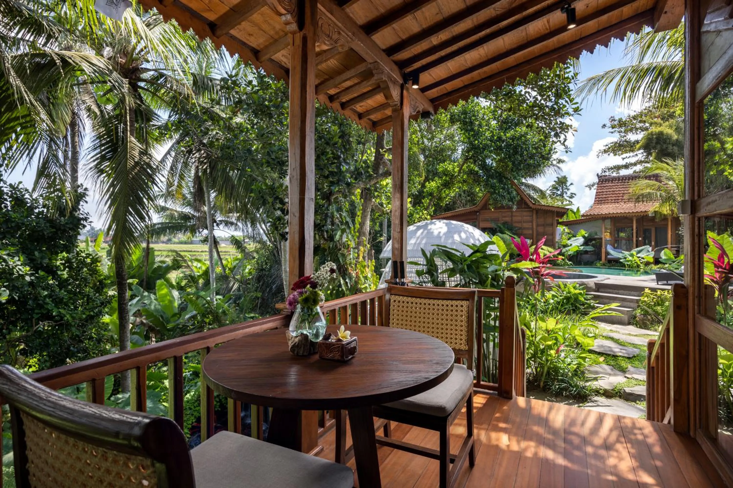 Balcony/Terrace in Berlima Wooden Lodge by GenuineHost