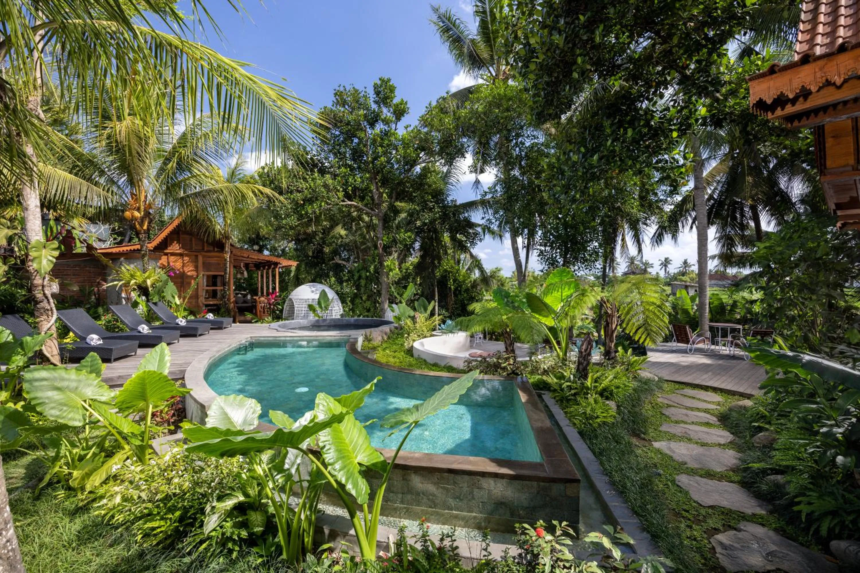 Swimming pool in Berlima Wooden Lodge by GenuineHost