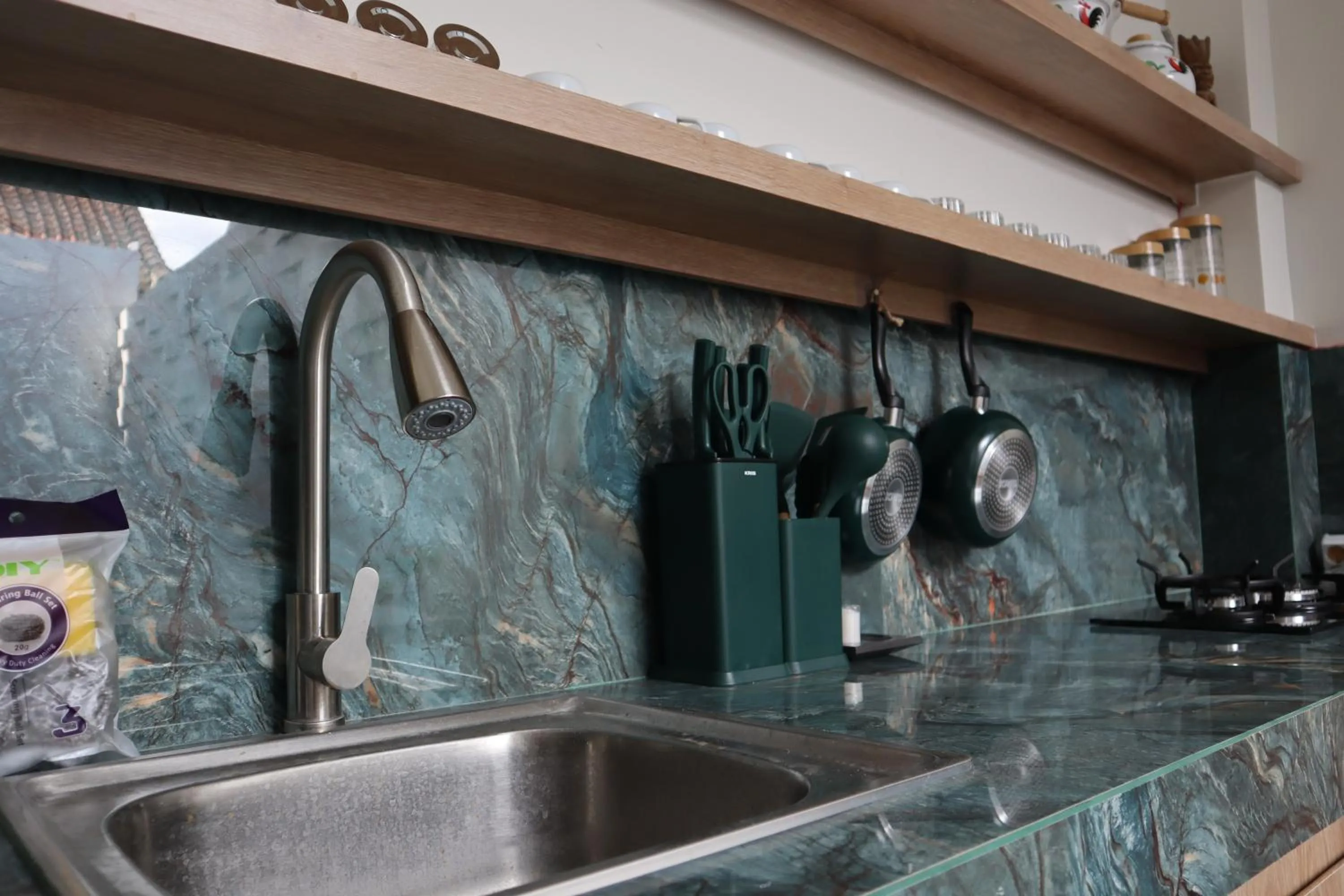 Kitchen or kitchenette in Puspa Villa