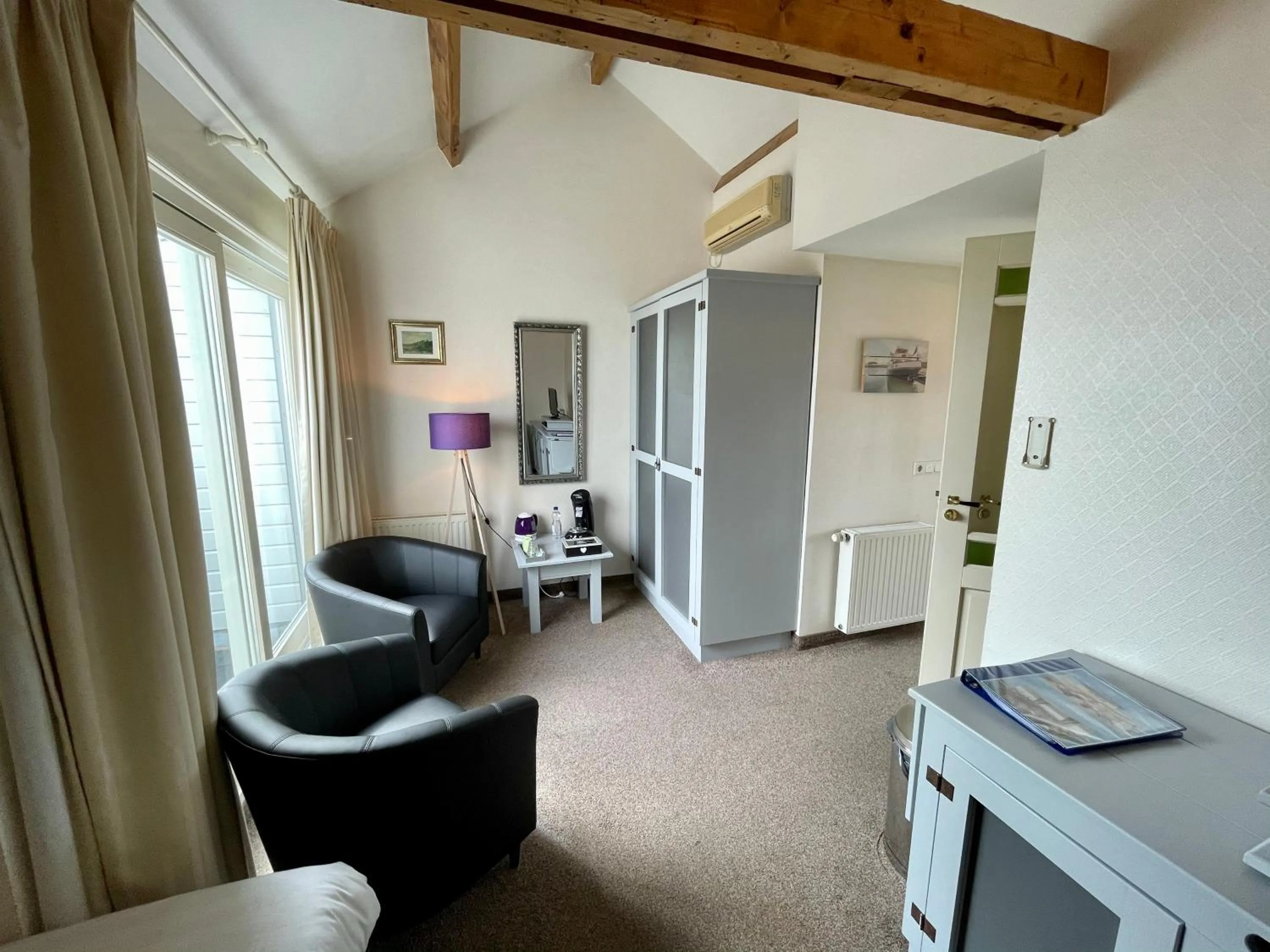 Seating area in Havenhotel At Sea Texel