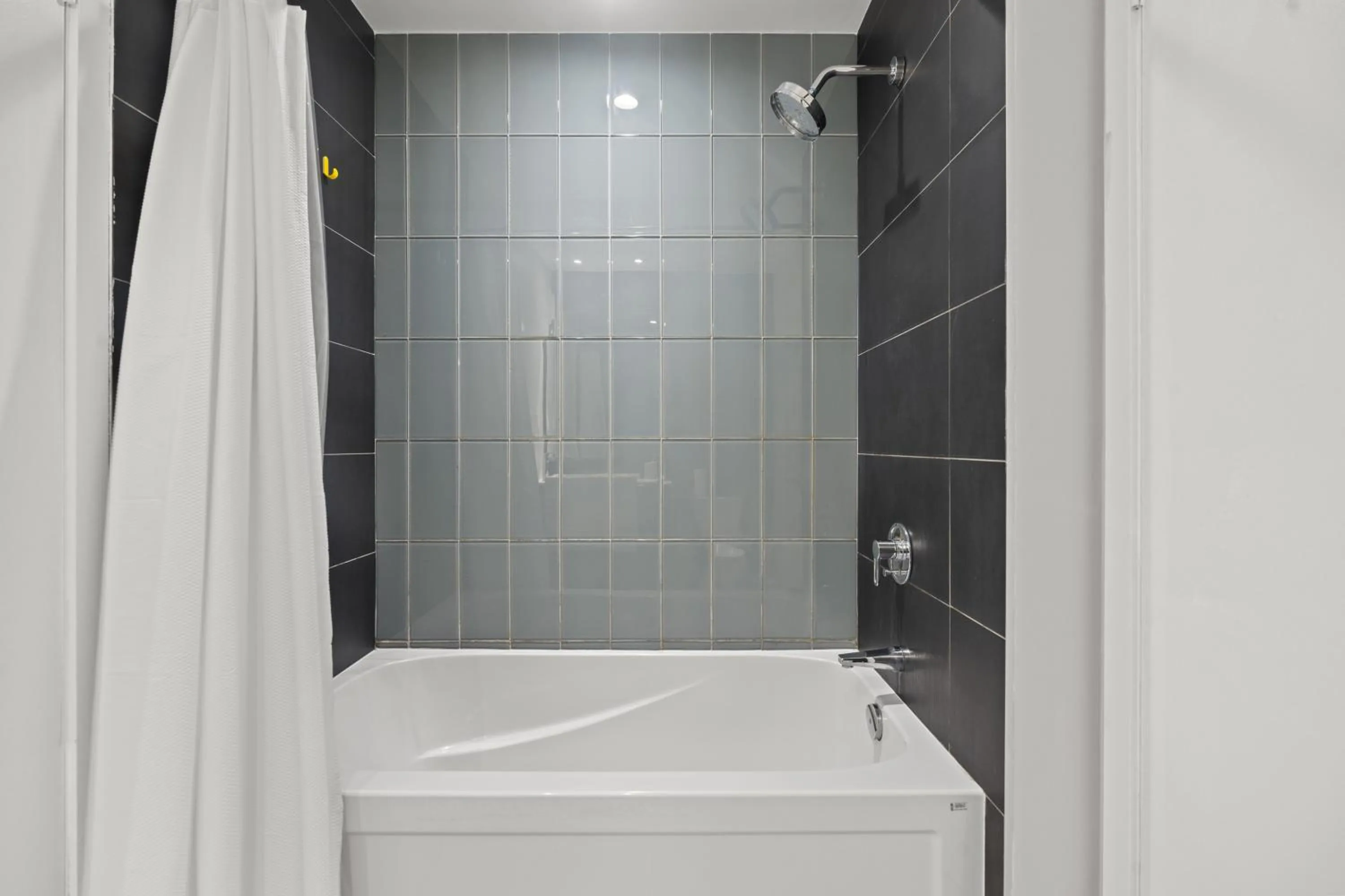 Shower in GLOBALSTAY Elegant Downtown Apartments