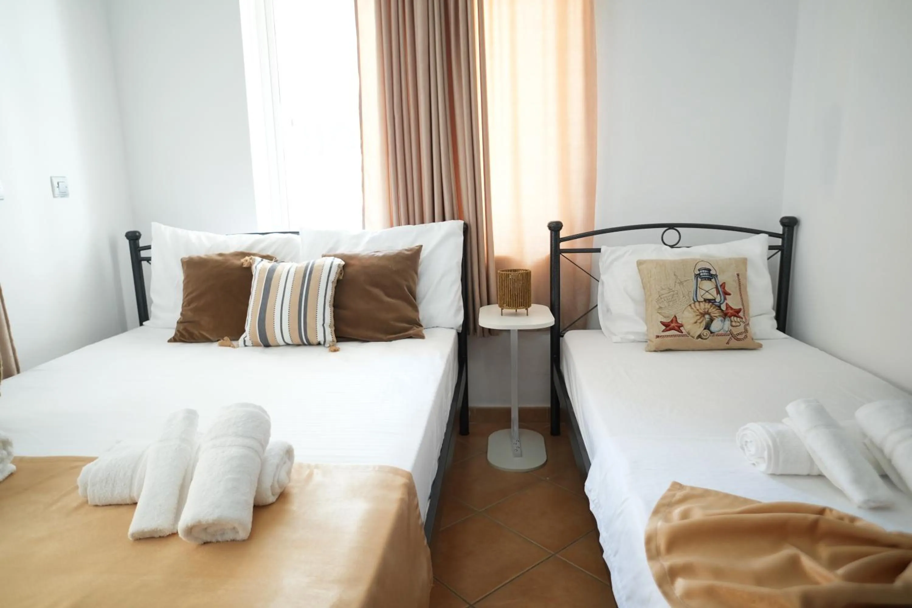 Bed in Saranda Waterside Apartments