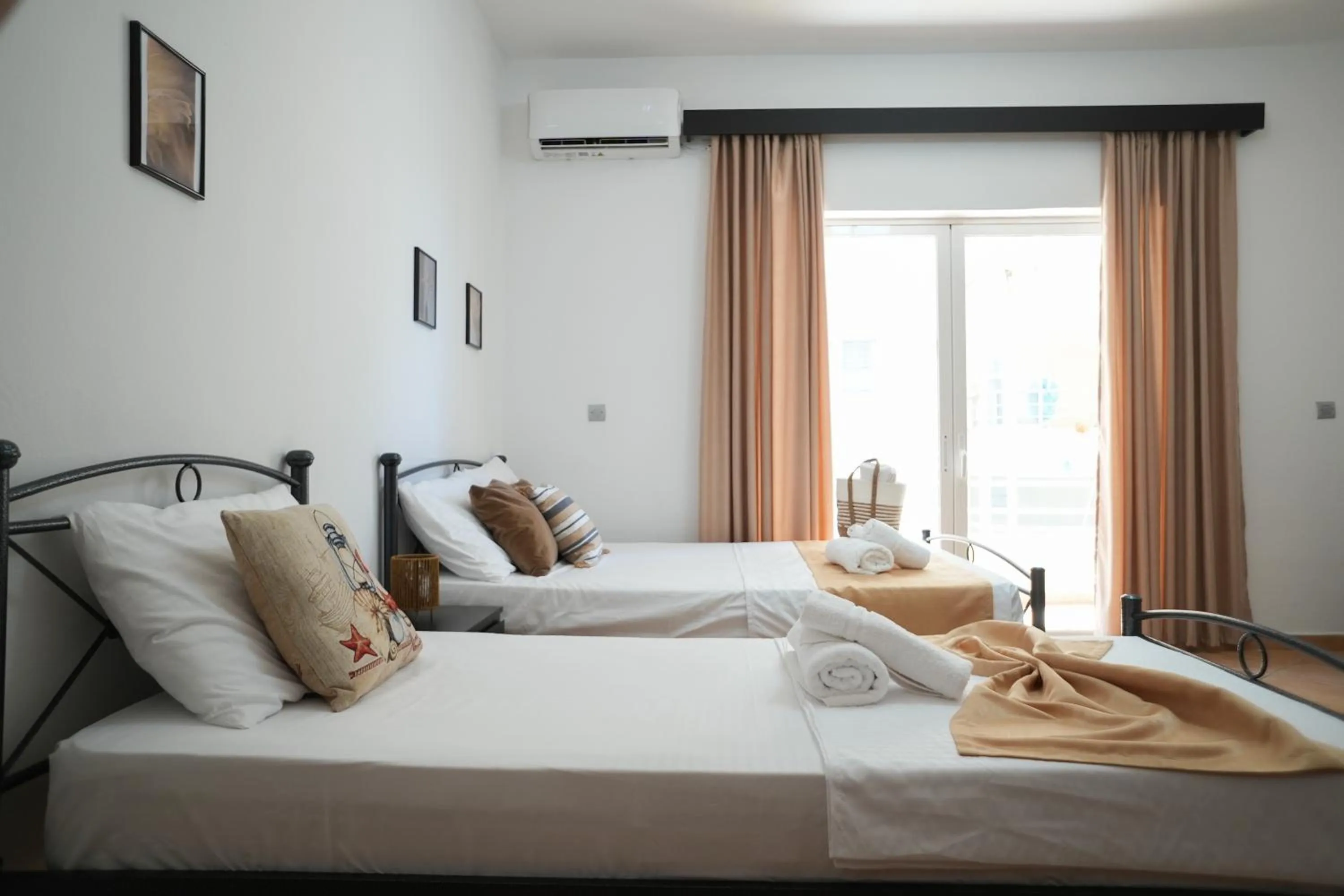 Bed in Saranda Waterside Apartments