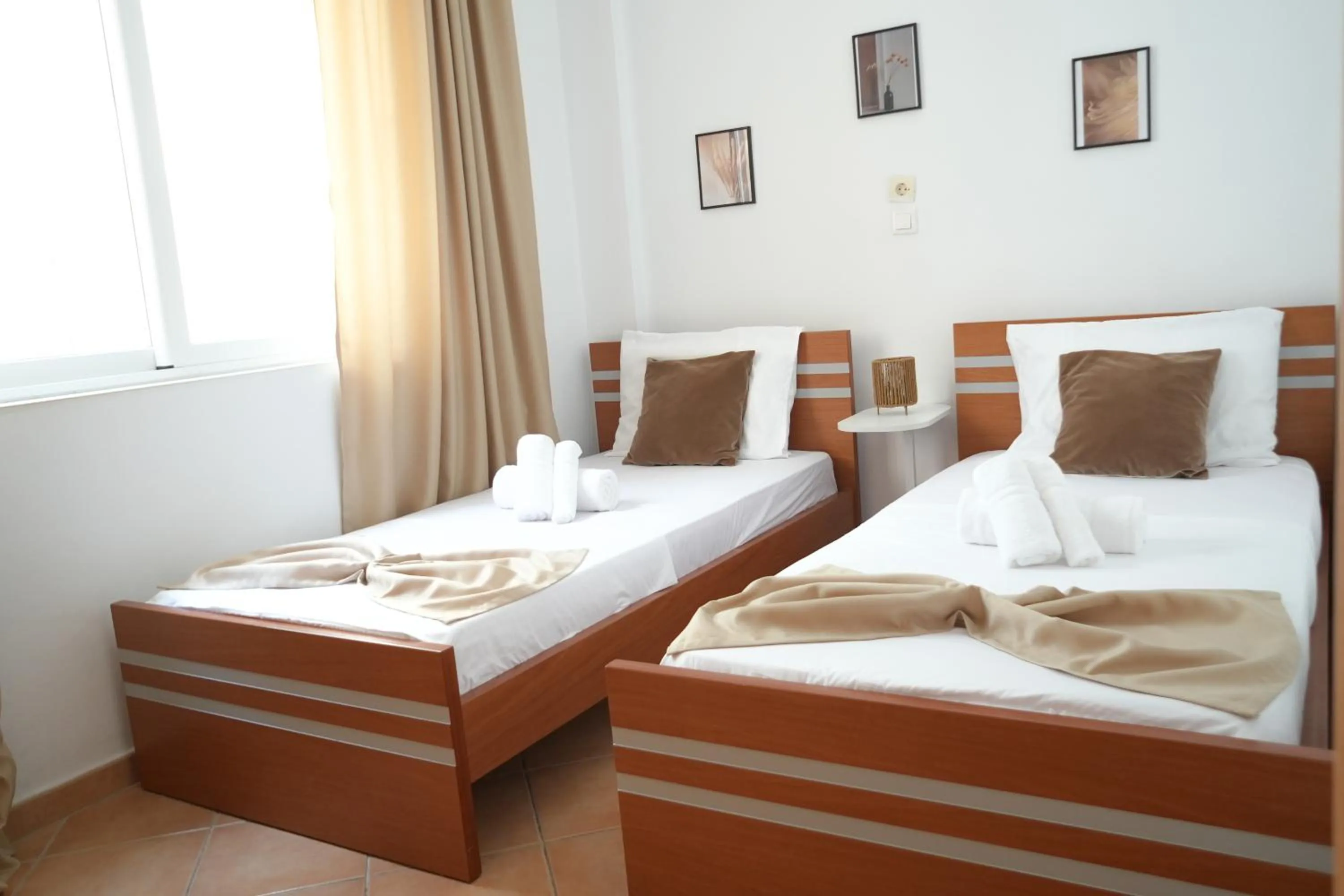 Bed in Saranda Waterside Apartments