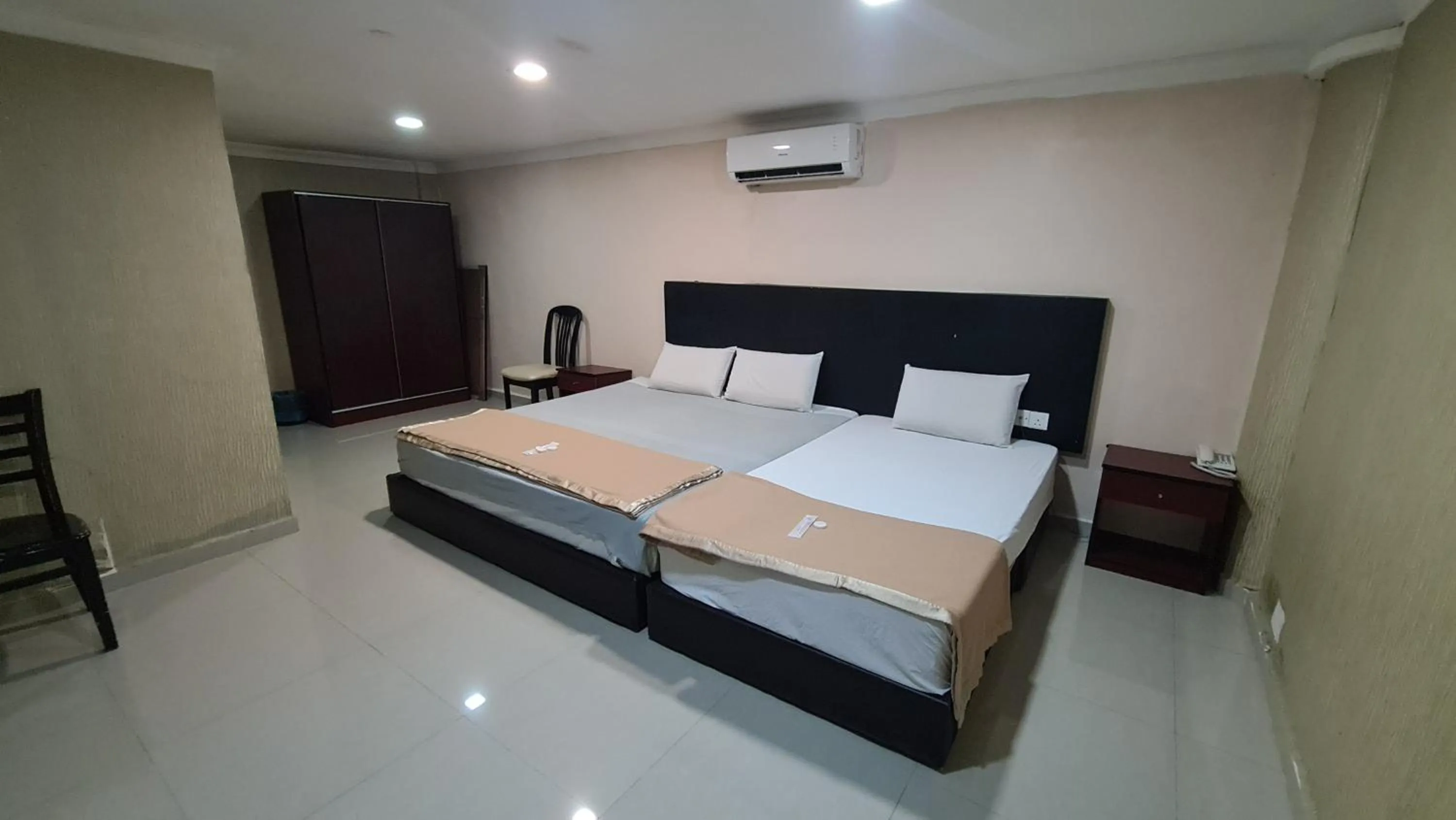 Bed in SP Venture Boutique Hotel