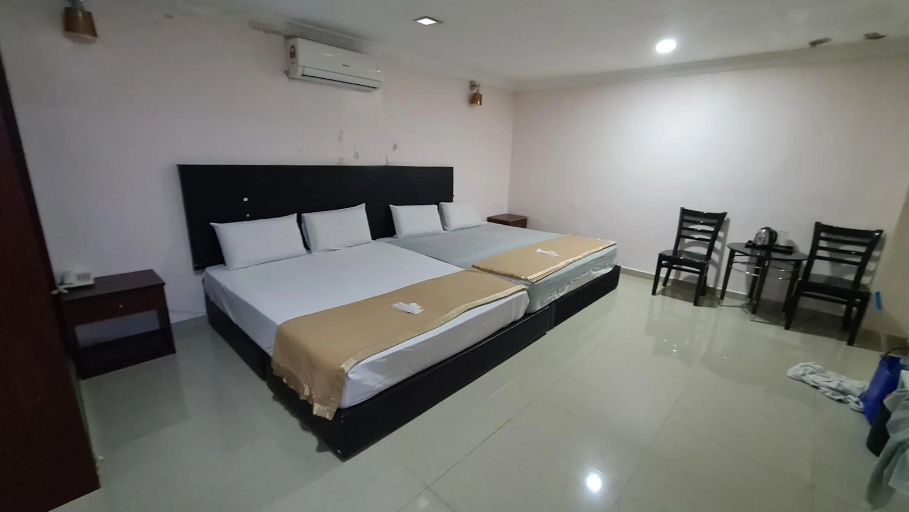 Bed in SP Venture Boutique Hotel