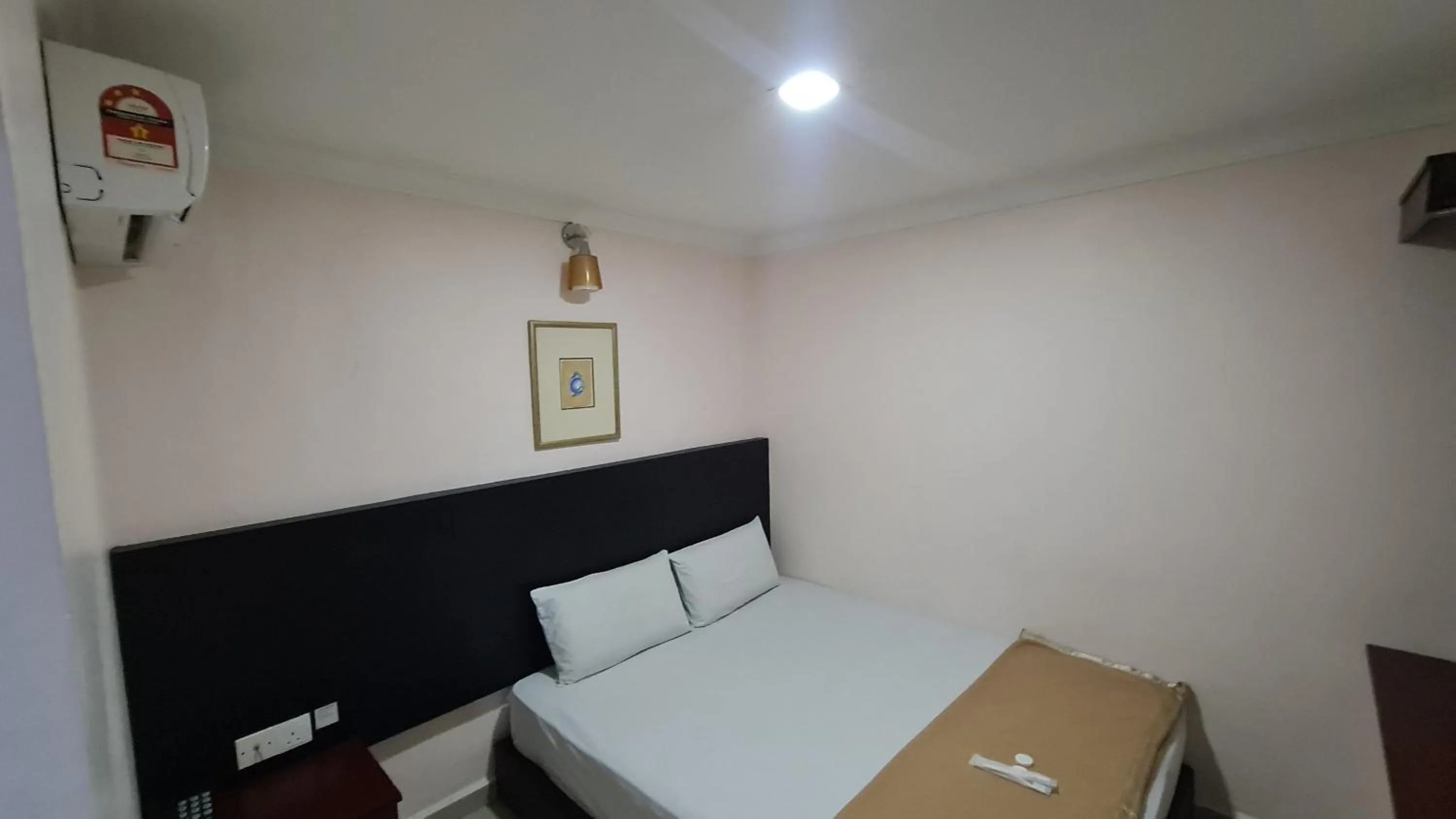 Bed in SP Venture Boutique Hotel