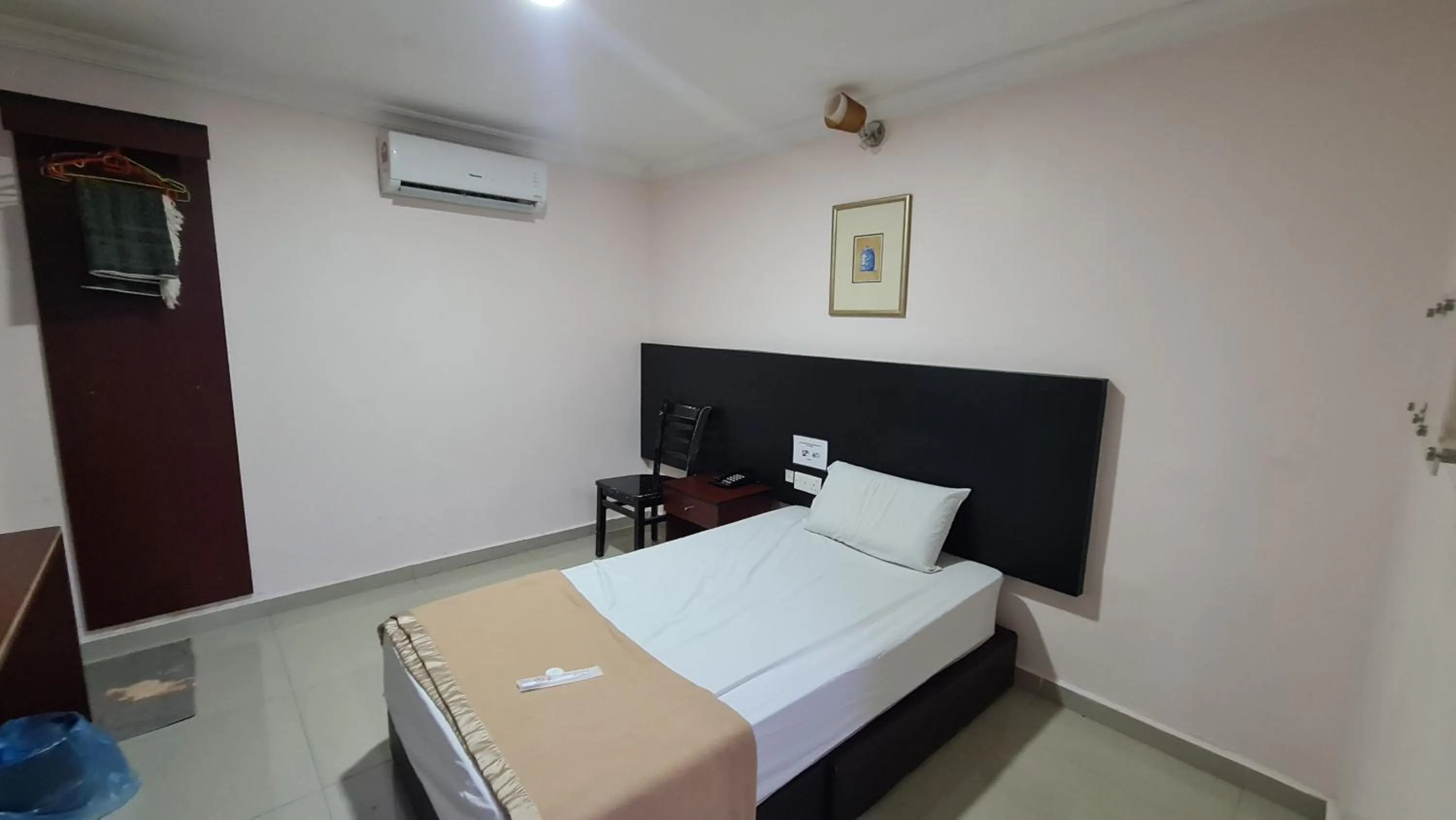 Bed in SP Venture Boutique Hotel