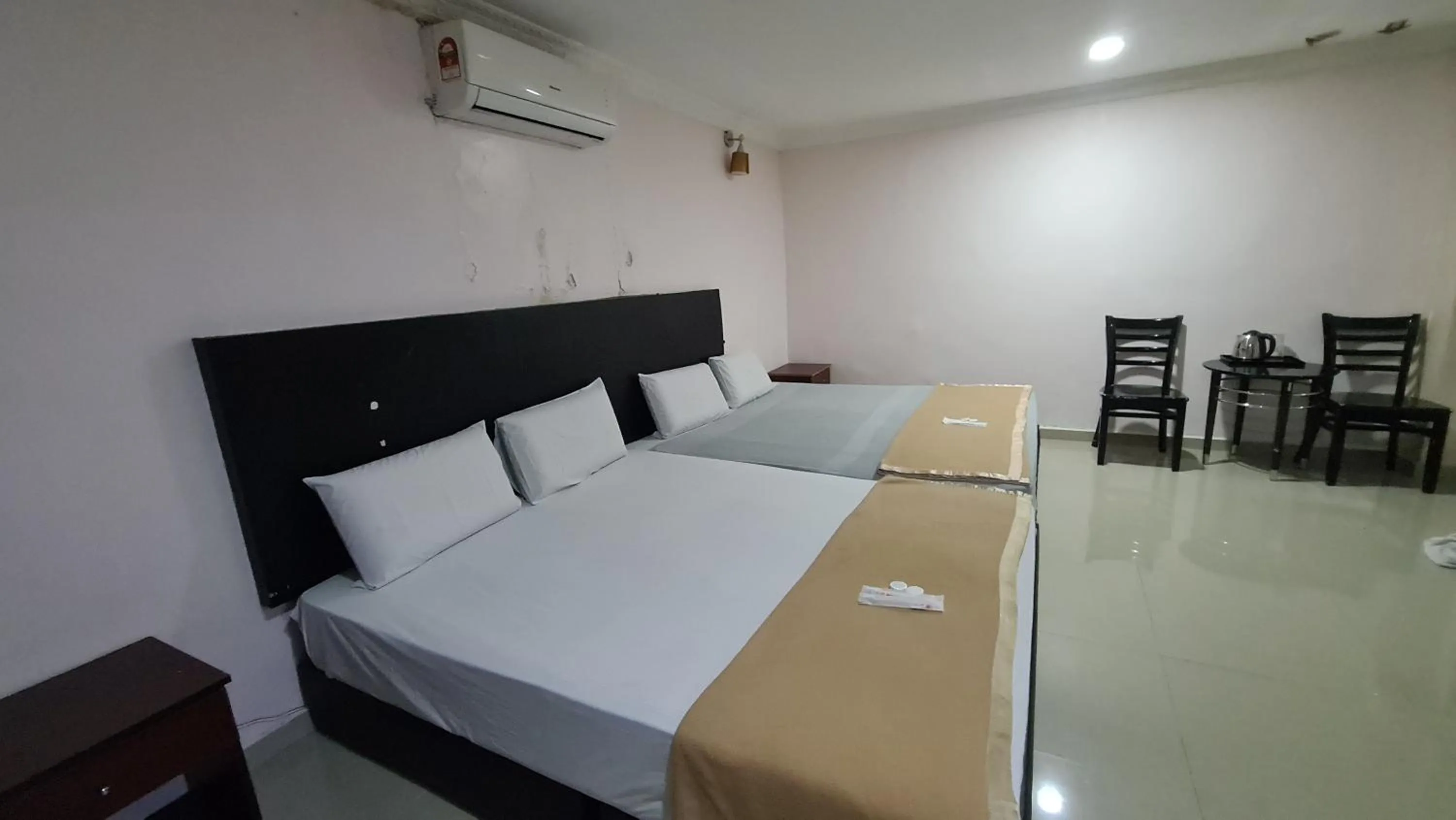 Bed in SP Venture Boutique Hotel