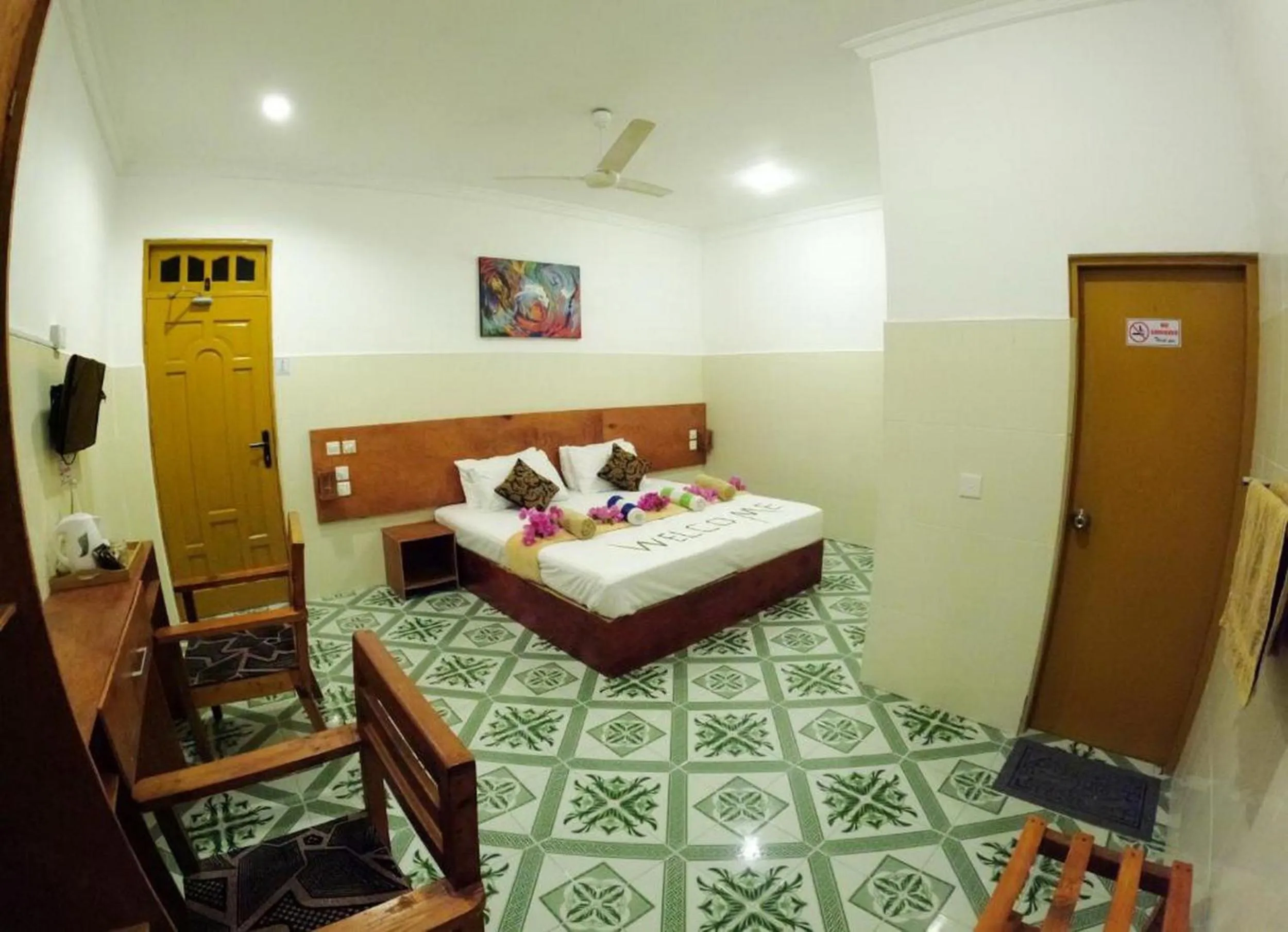 Bed in Adroit Beach Inn