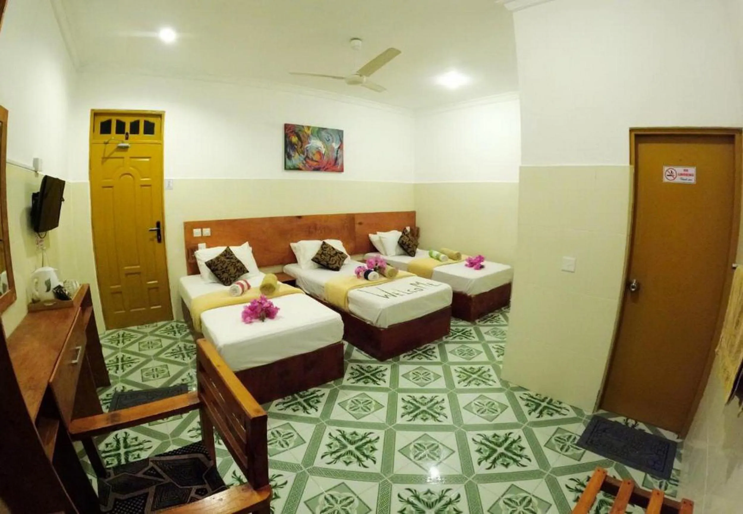 Bed in Adroit Beach Inn