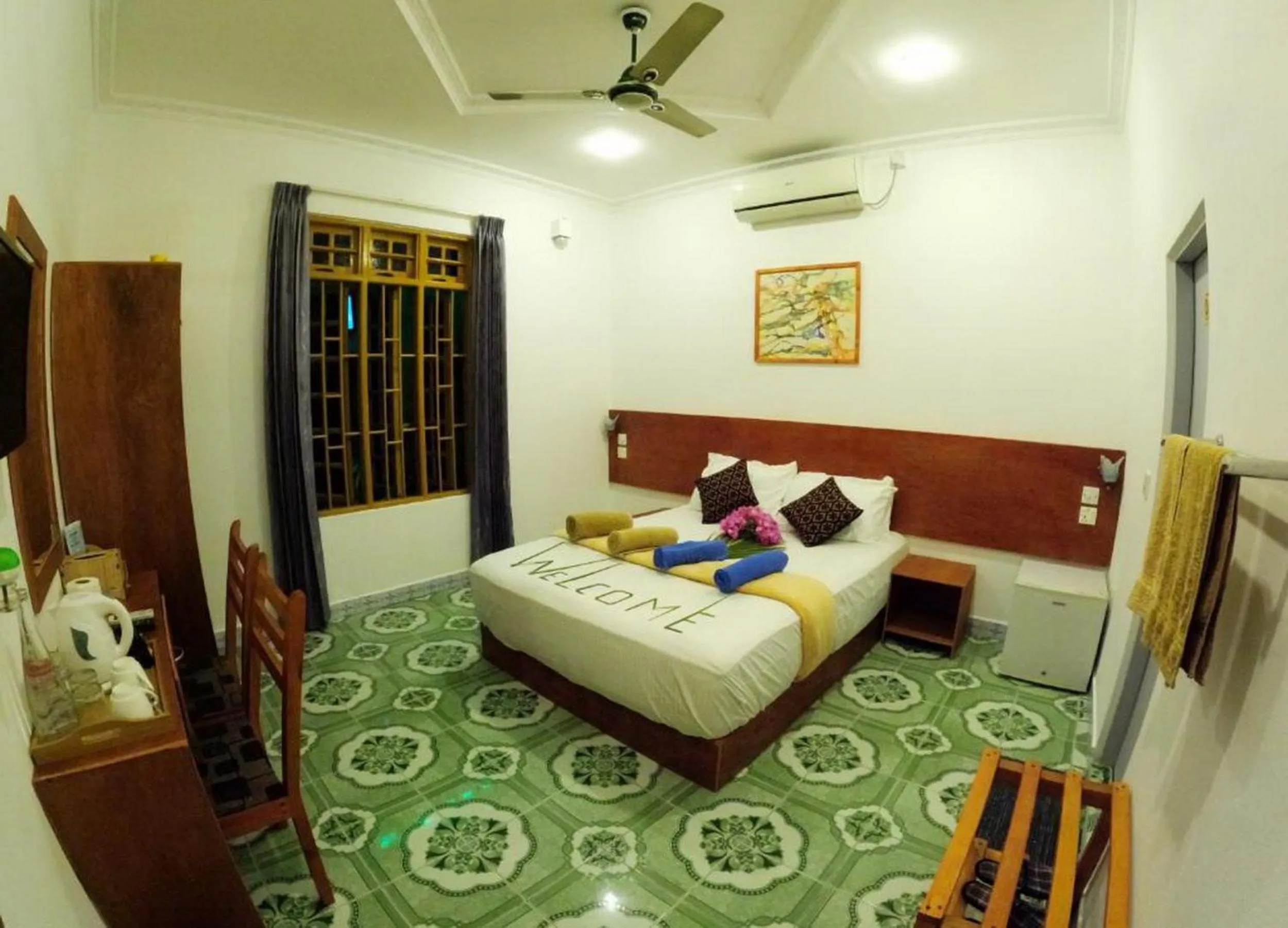 Bed in Adroit Beach Inn