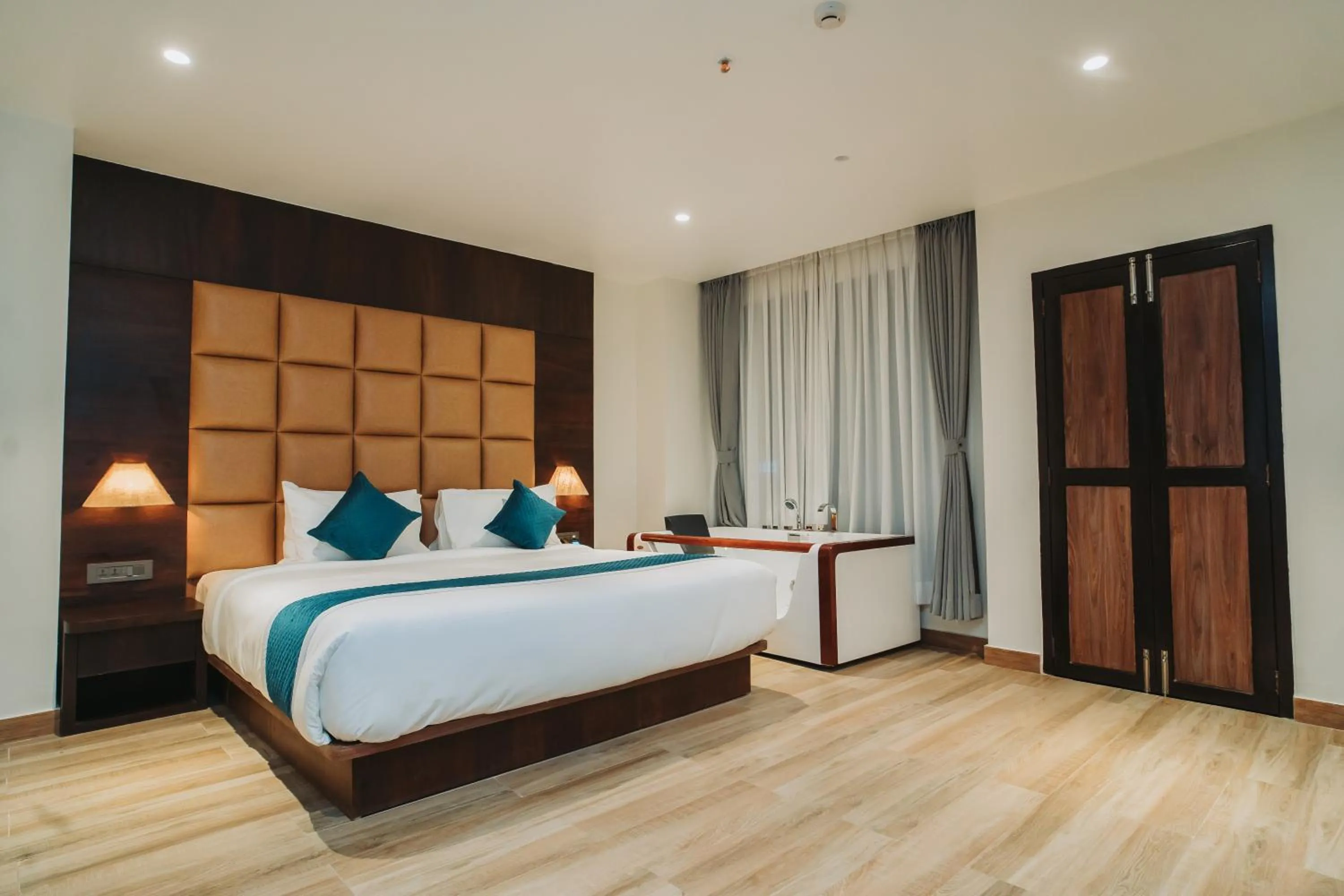 Bed in Dees Boutique Hotel