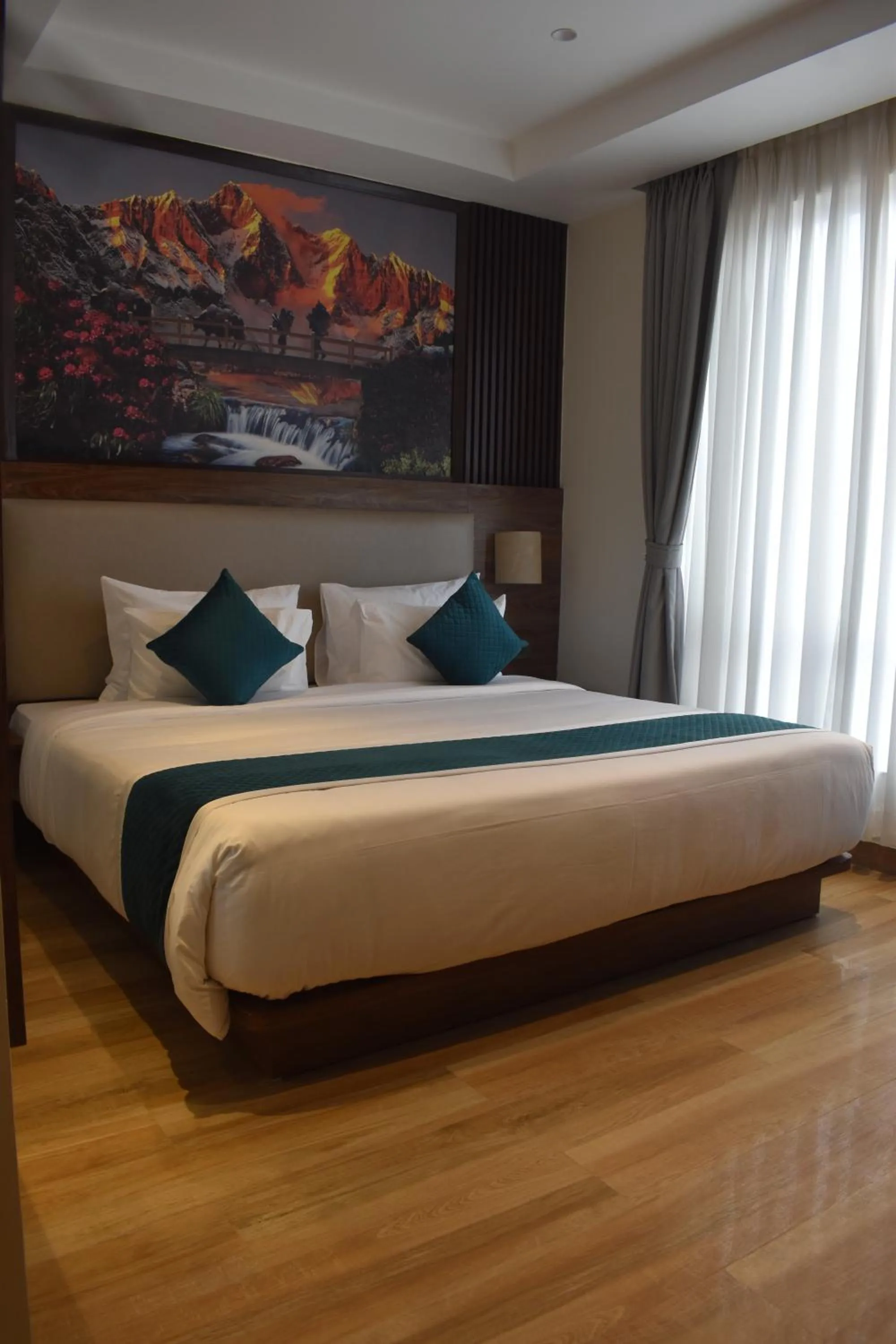 Bed in Dees Boutique Hotel