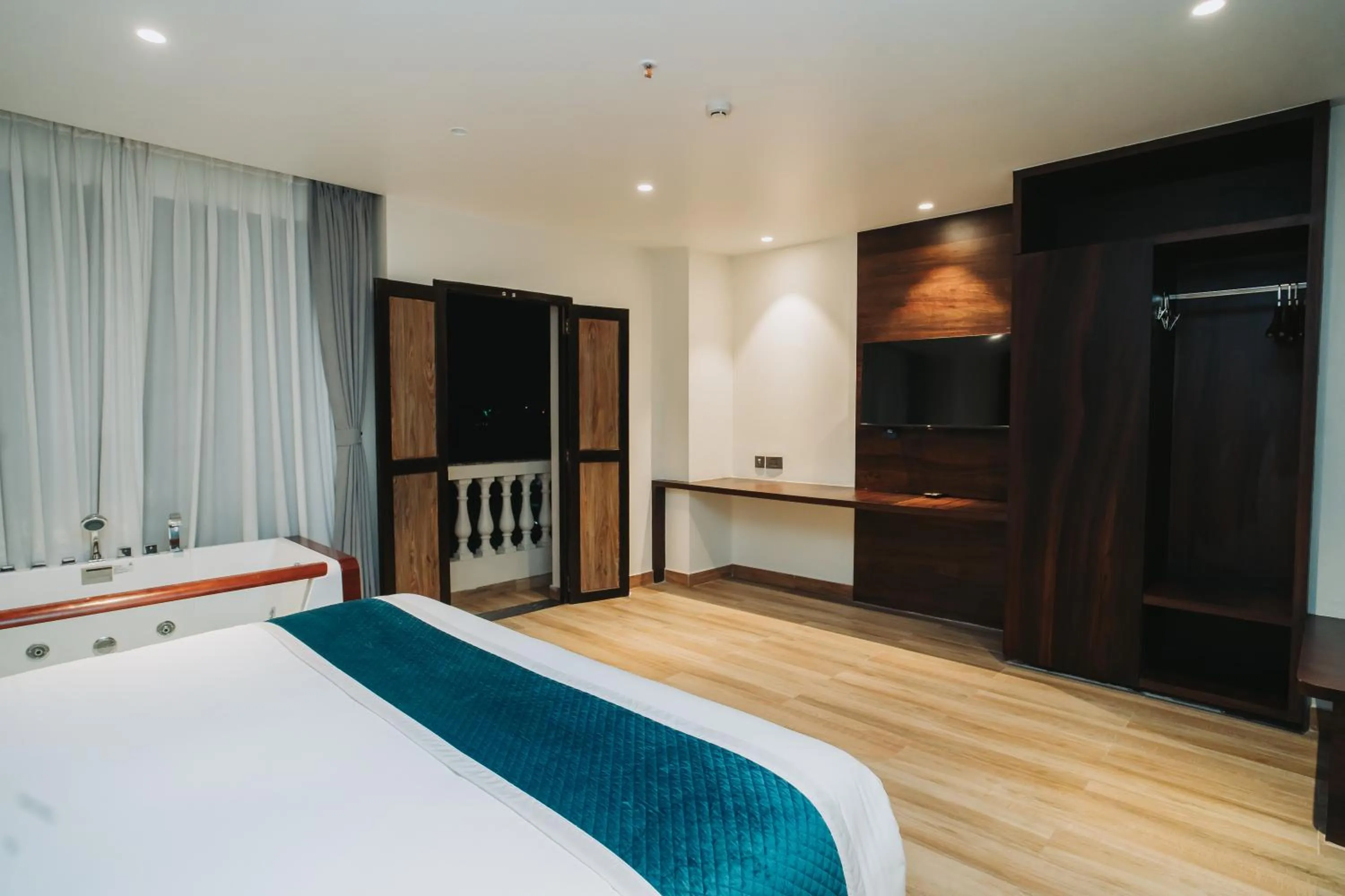 Bed in Dees Boutique Hotel