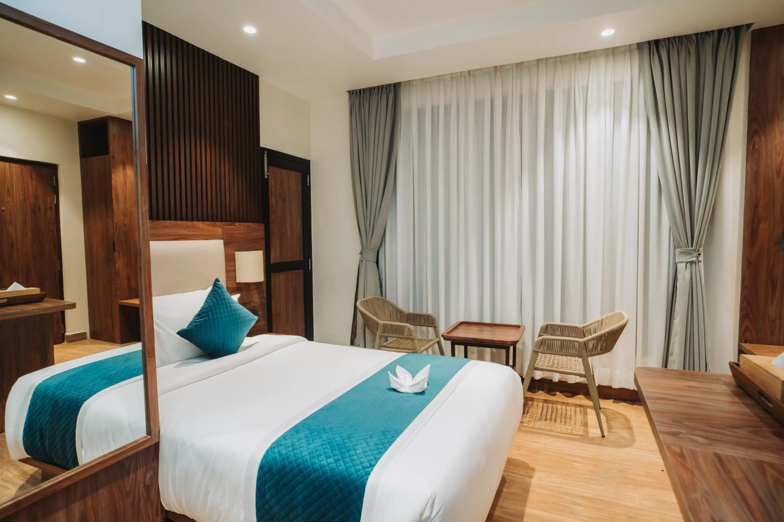 Bed in Dees Boutique Hotel