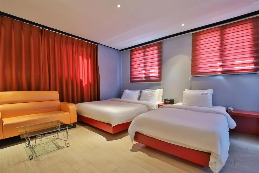 Bed in Hermes Hotel
