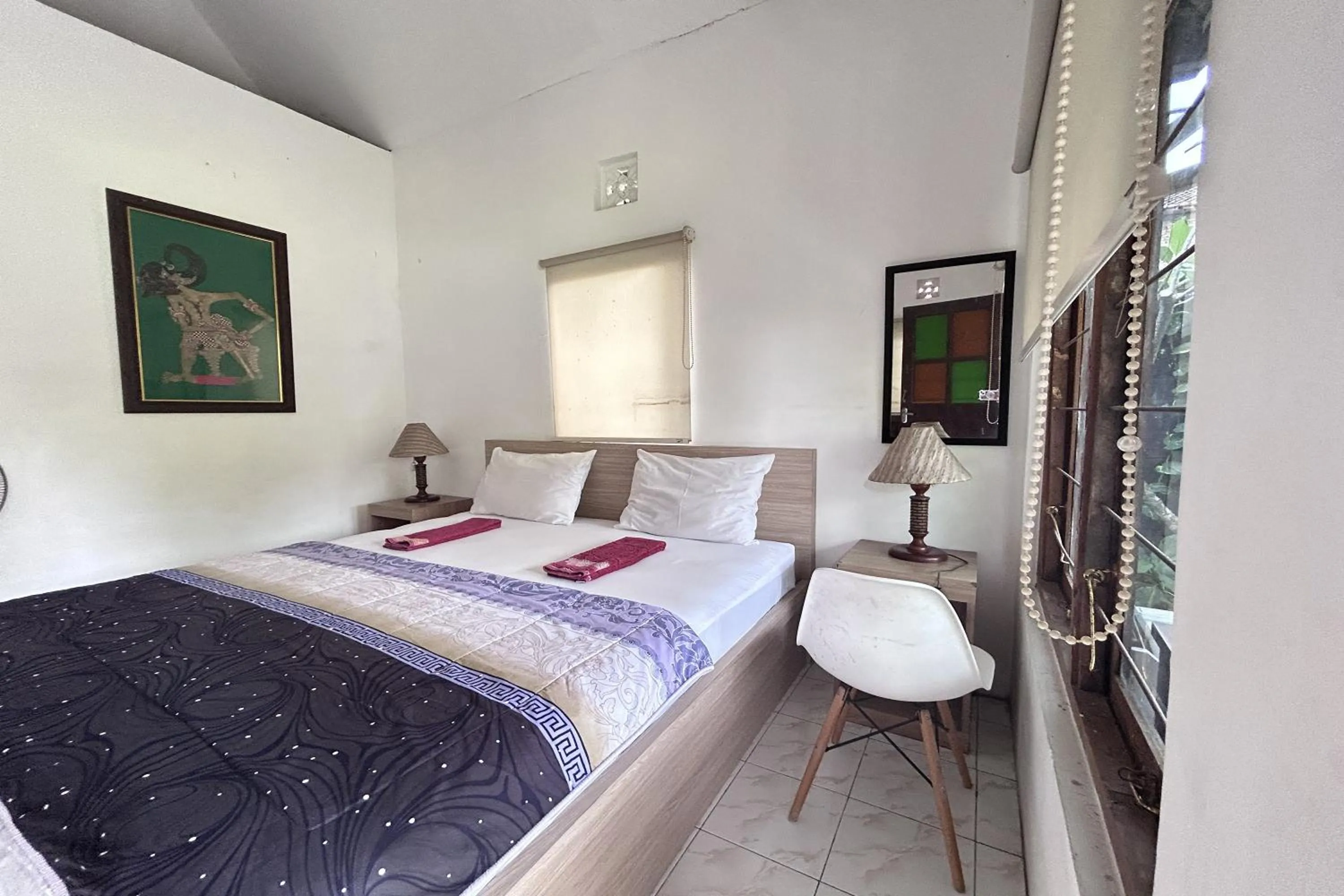 Photo of the whole room, Bed in Carla Garden