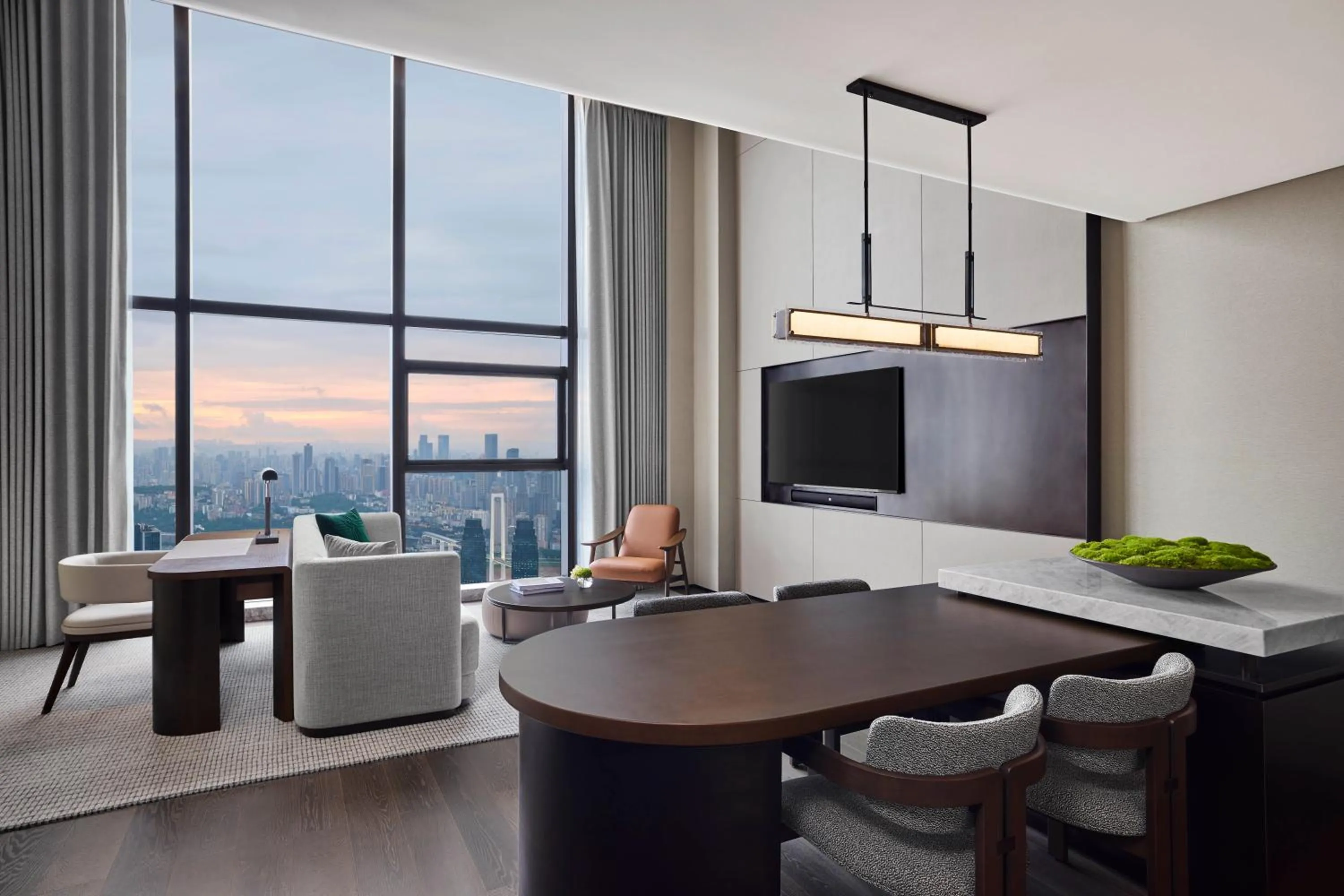Communal lounge/ TV room in Conrad Chongqing - Indulge in the magical 8D city landscape